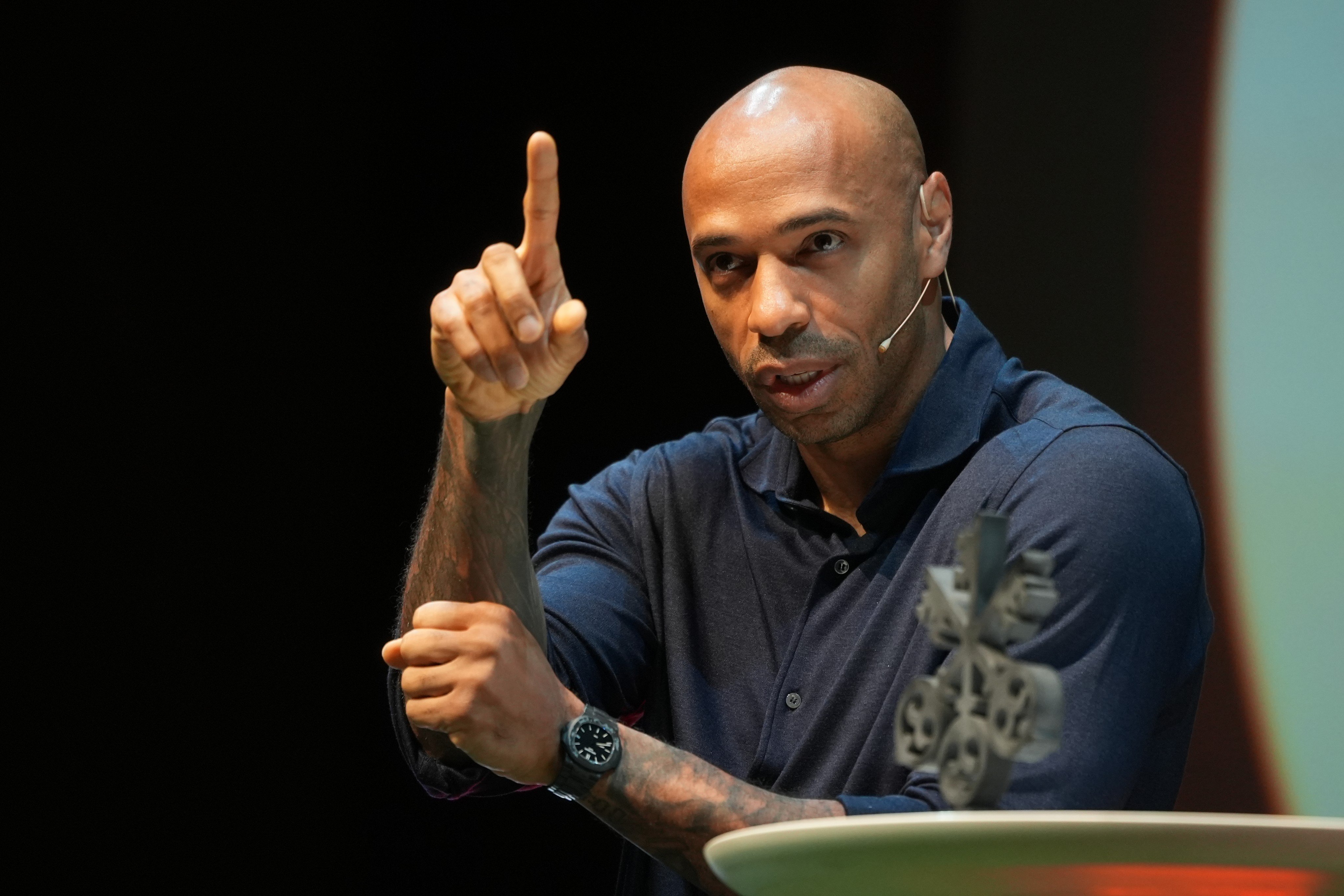 Former France and Arsenal forward Thierry Henry speaking to about 600 pupils at the Hong Kong Jockey Club Amphitheatre on Tuesday. Photo: Sun Yeung