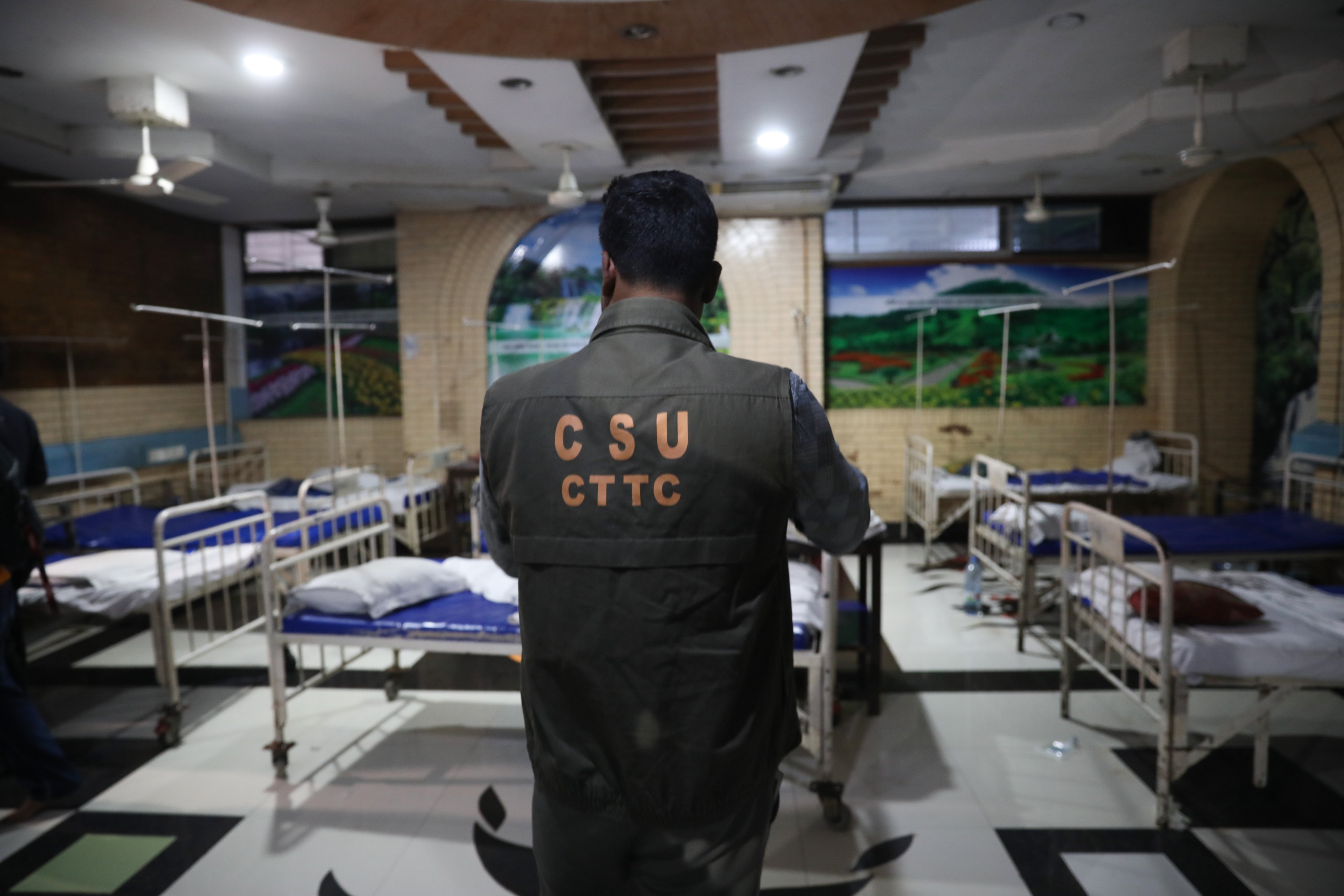 A Bangladesh Counter Terrorism and Transnational Crime official, from the specialised unit of the Dhaka Metropolitan Police, inspects the scene at the post-operative ward of the Ad-din Hospital in Dhaka on Wednesday. Photo: EPA