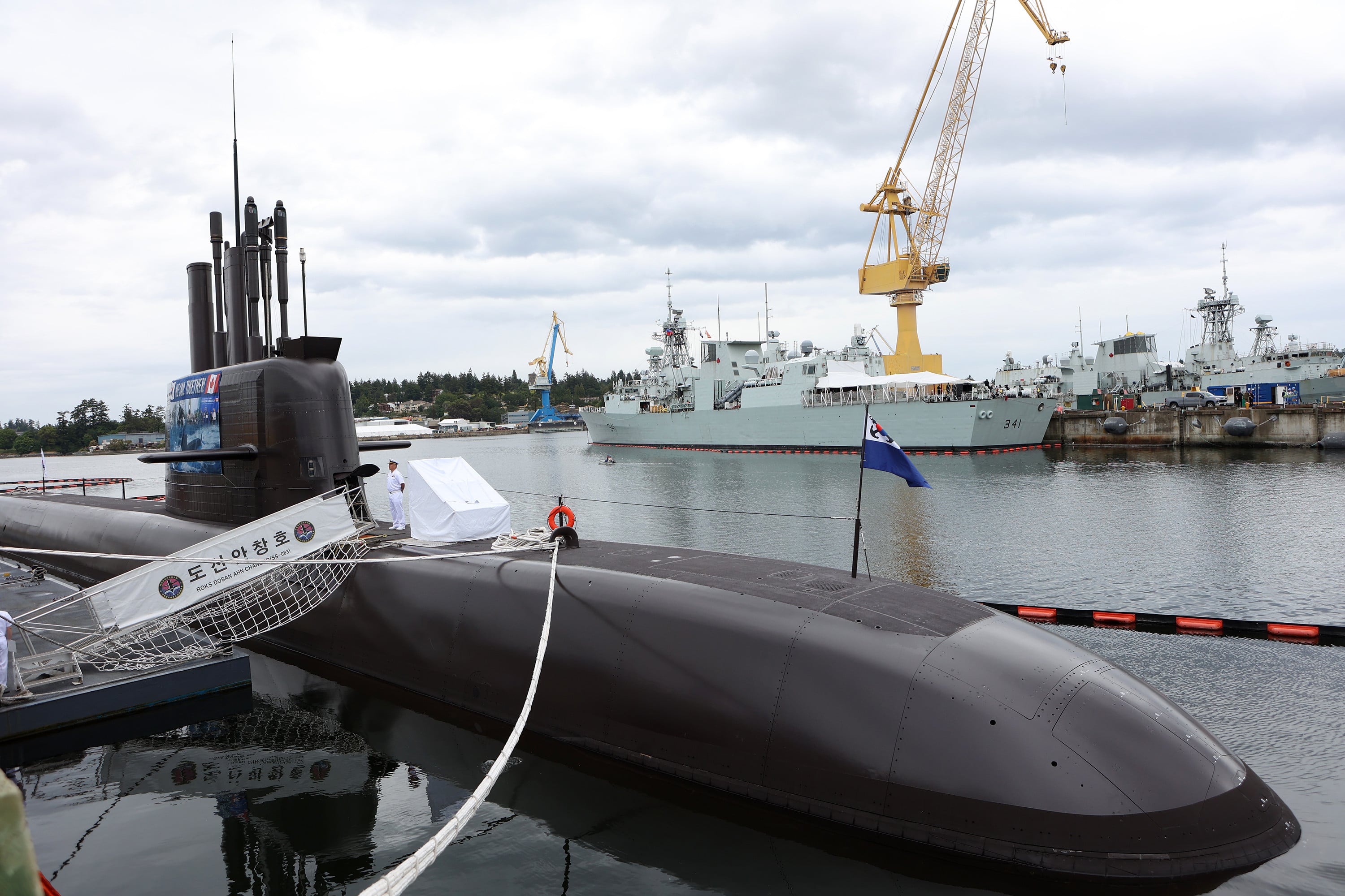 The Republic of Korea Navy KSS-III submarine, known as Dosan Ahn Chang-ho, and the ROKS Daejeon frigate at the Canadian Forces Base Esquimalt in British Columbia on Monday. Photo: The Canadian Press via AP