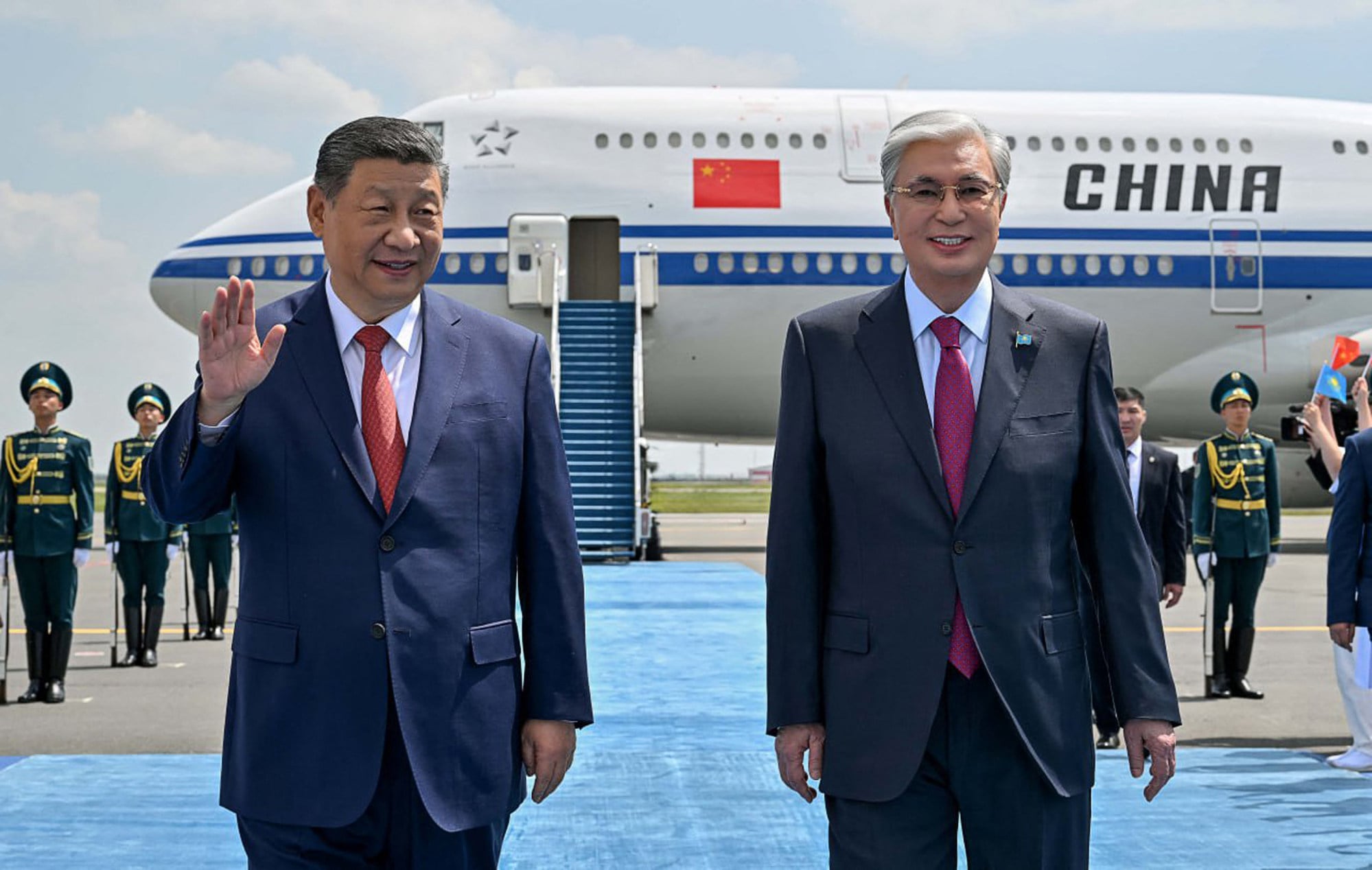 Chinese President Xi Jinping (left) waves after arriving in Astana for the second China-Central Asia Summit in June. Kazakhstan’s President Kassym-Jomart Tokayev was at the airport to welcome the Chinese leader. Photo: AFP