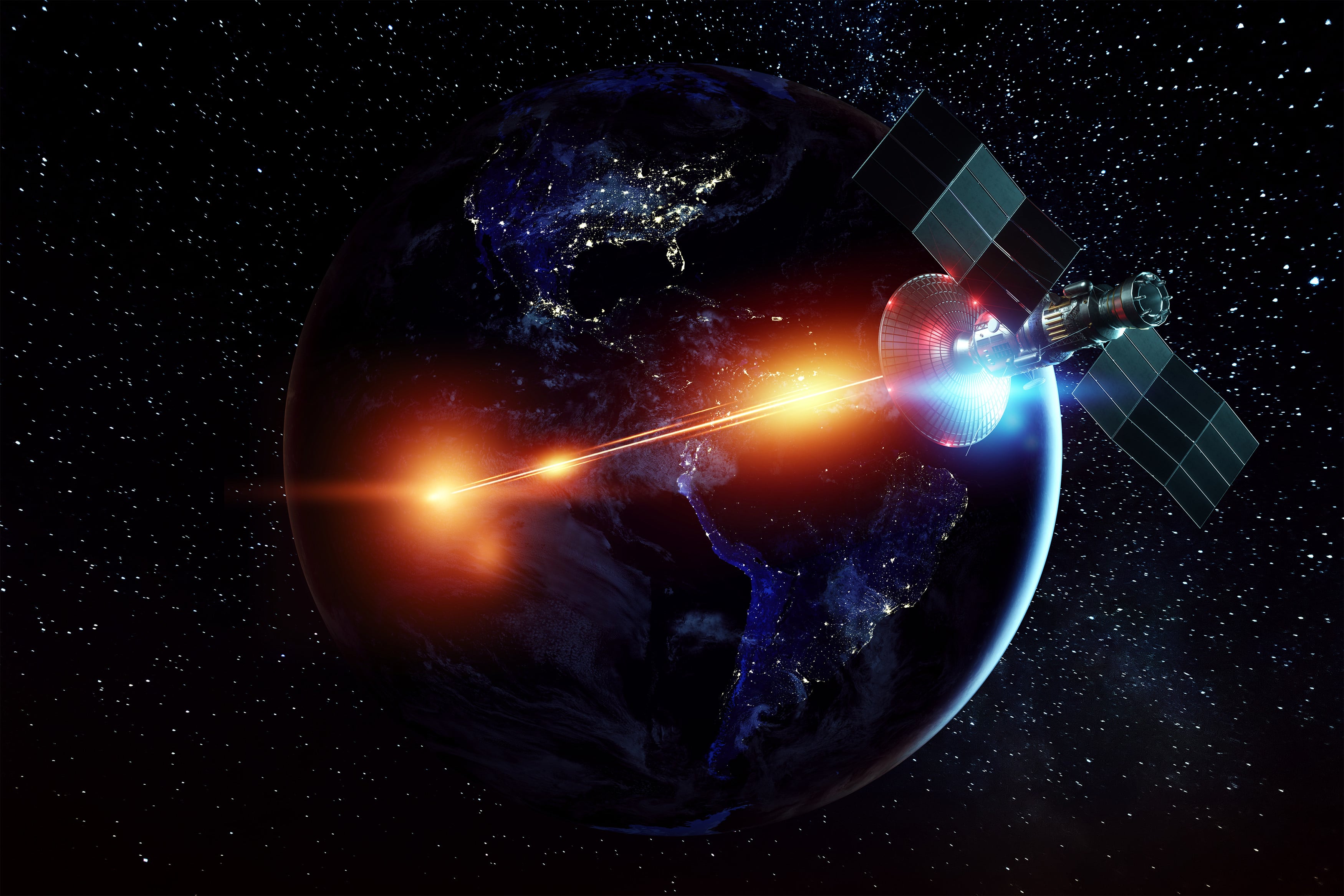 An illustration shows a space military satellite shooting a laser against the background of the Earth. Photo: Shutterstock