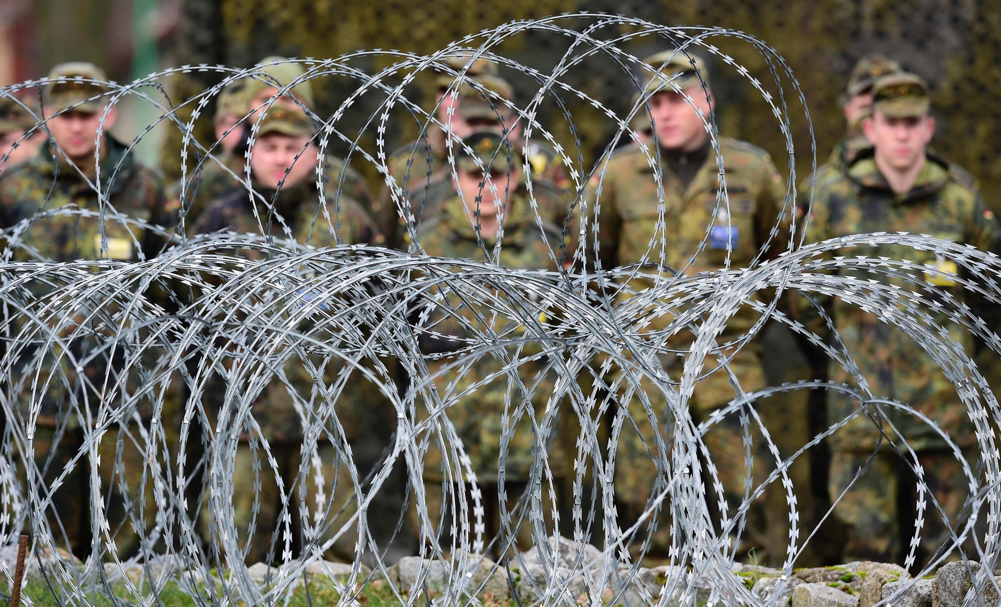 Polish and German soldiers pose outside the Main Command Post at the multinational Nato Corps in Szczecin, Poland in 2016. Photo: AFP