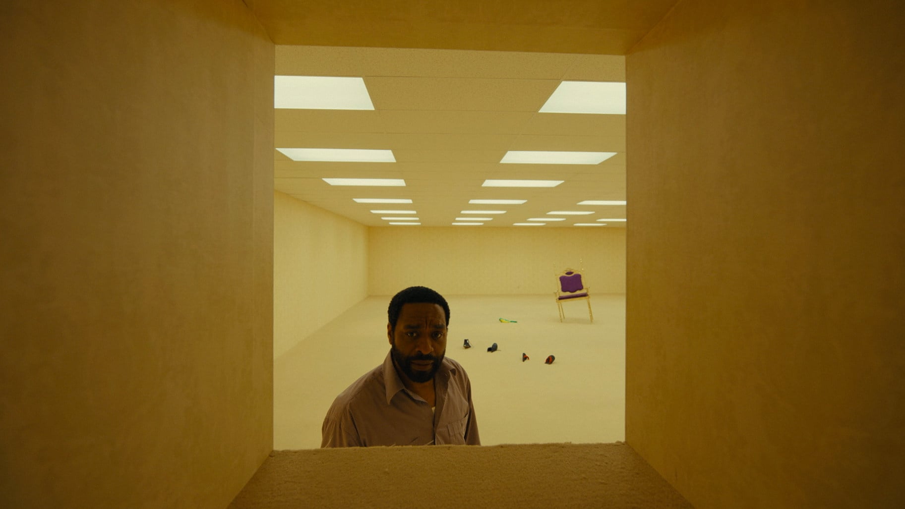 Chiwetel Ejiofor in a still from Backrooms (category IIB), directed by Kane Parsons. Renate Reinsve and Mark Duplass co-star.