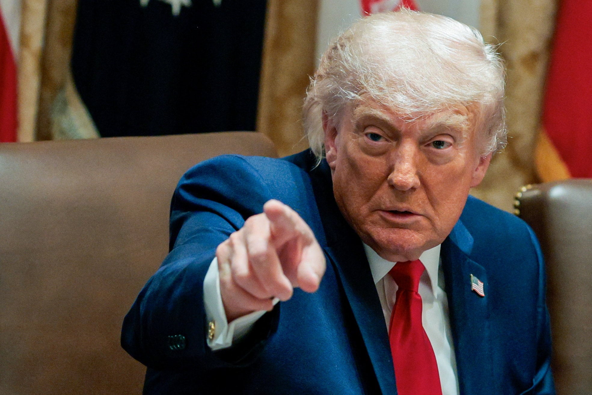 US President Donald Trump points his finger during a cabinet meeting at the White House on Wednesday. Photo: Reuters