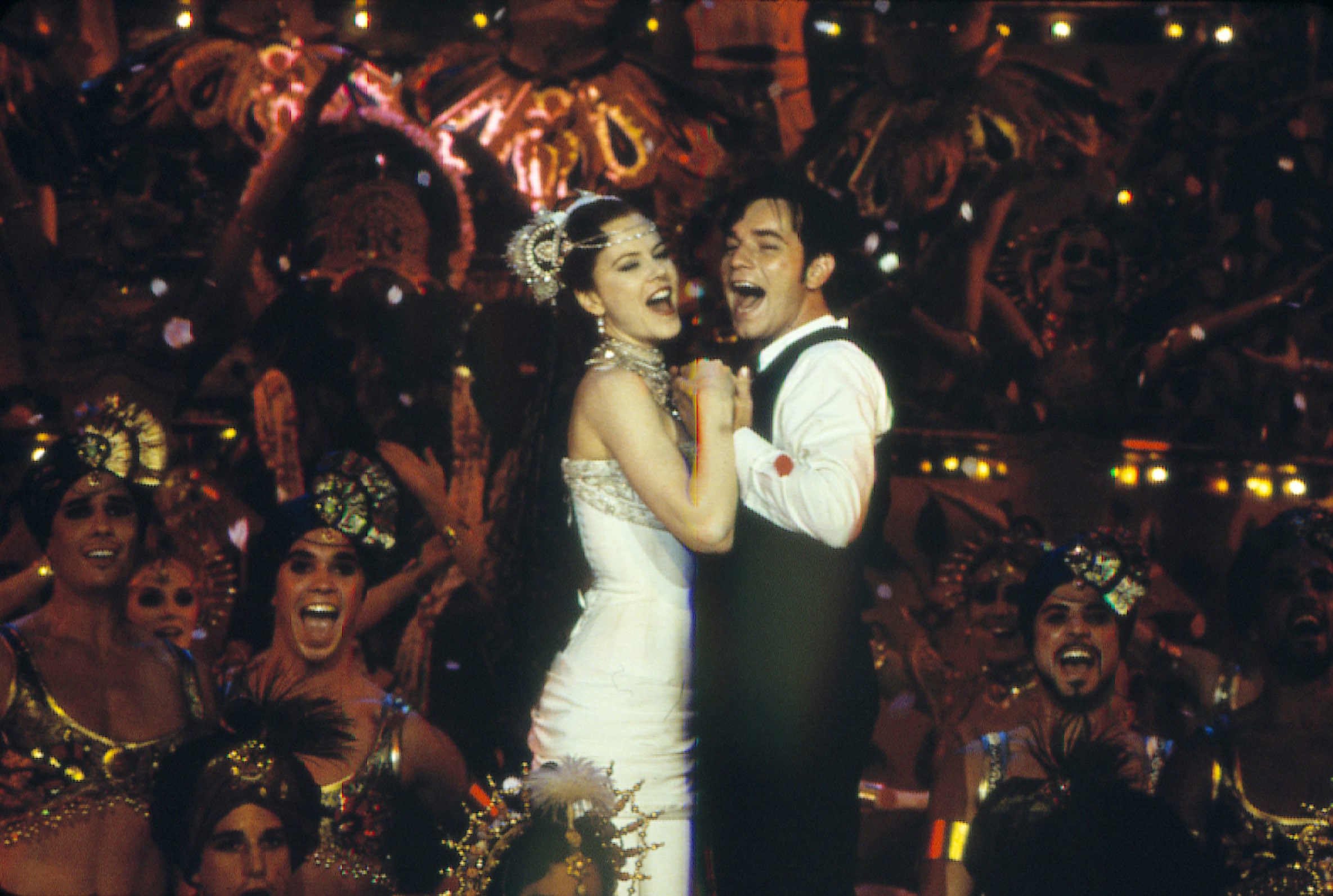Nicole Kidman and Ewan McGregor in a still from Moulin Rouge (2001), directed by Baz Luhrmann. The film is the final part of Luhrmann’s Red Curtain Trilogy, following Strictly Ballroom (1992) and Romeo + Juliet (1996).