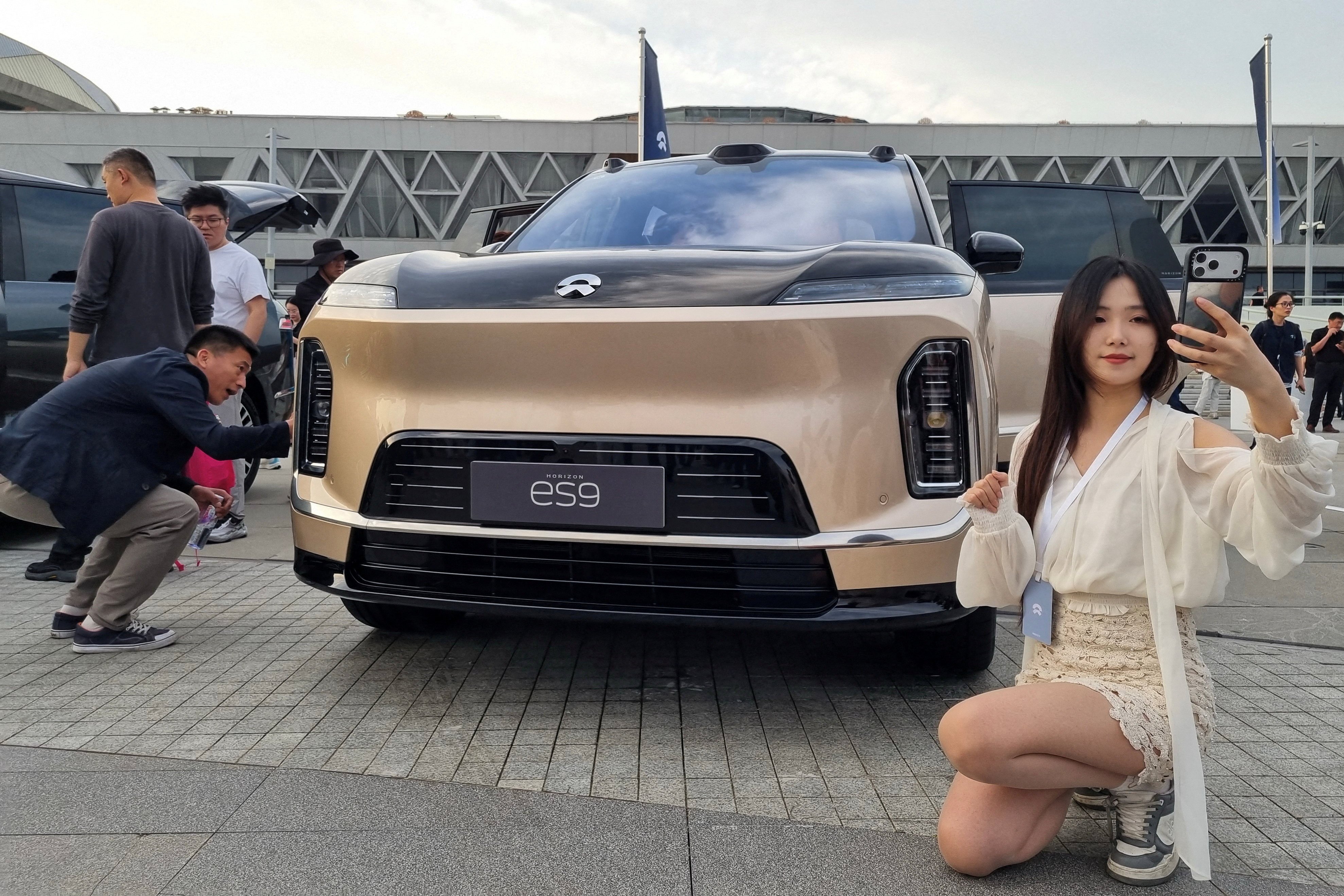 scmp.com - Daniel Ren - Premium plan: China's EV makers pin hopes on higher-margin models