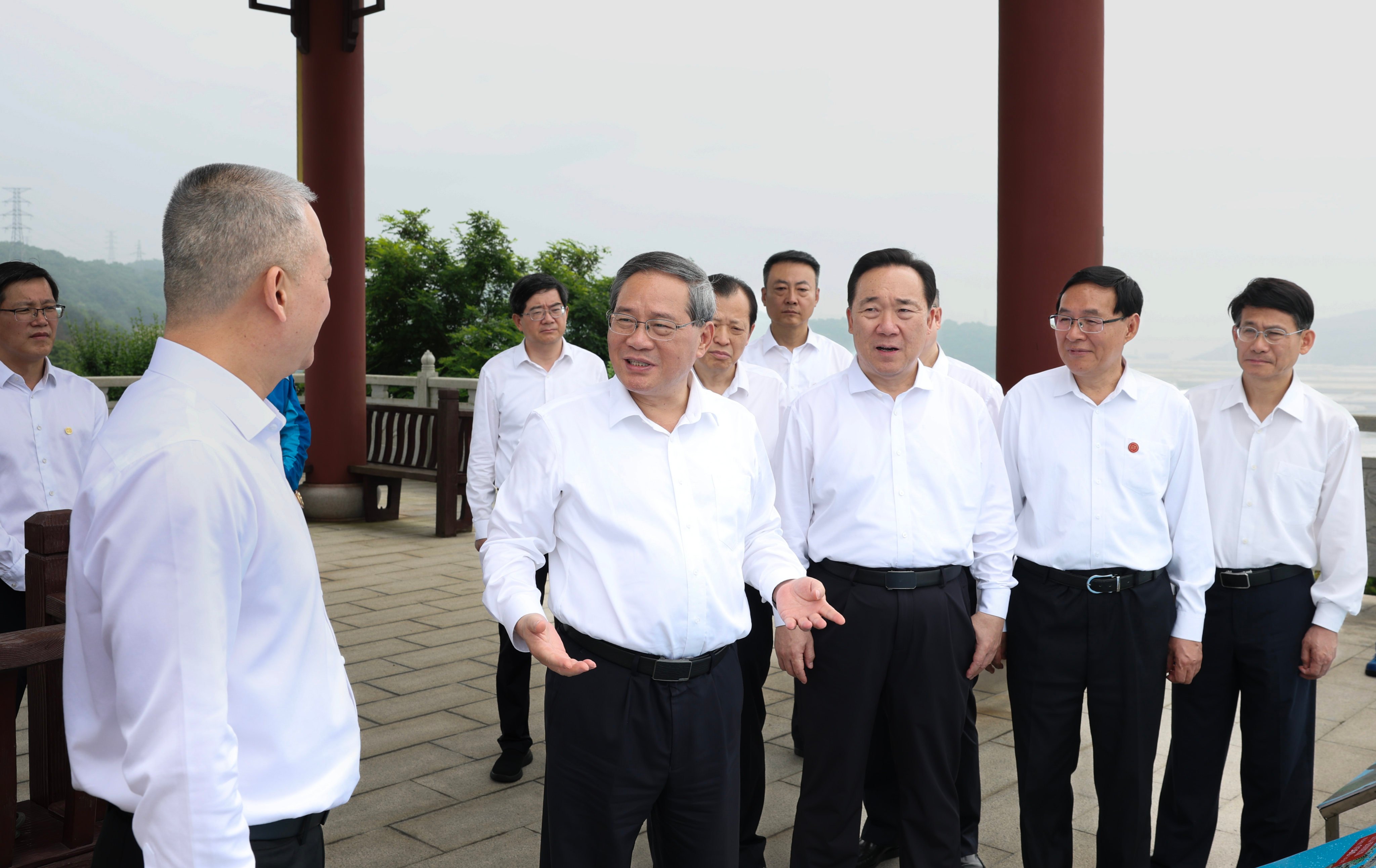 Chinese Premier Li Qiang (second left) quizzes officials about an oil reserve facility during his trip to China’s eastern Zhejiang province earlier this week. Photo: Xinhua