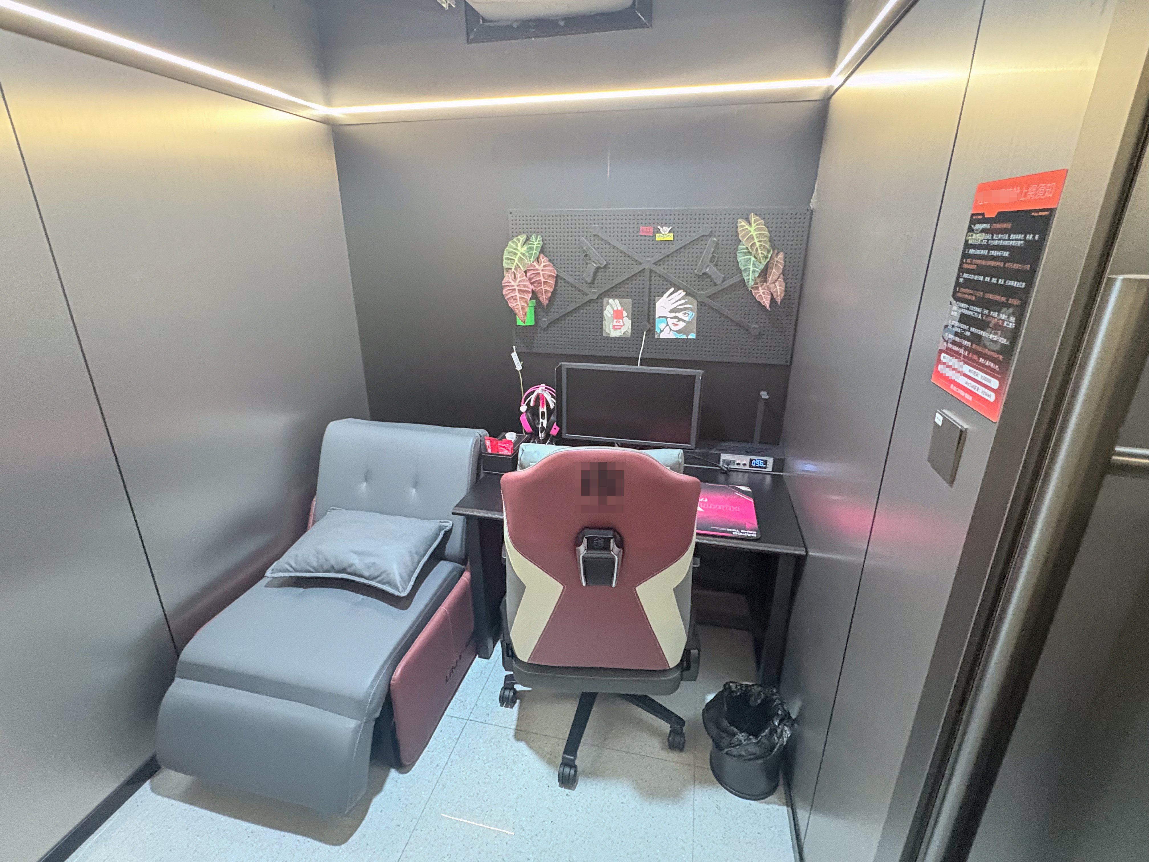 Some Hong Kong internet cafes are offering private booths that can be rented for the night and include a place to sleep. Photo: Eric Jiang
