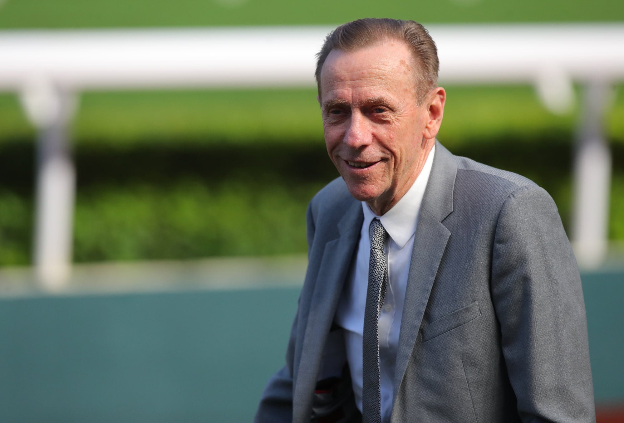 John Size celebrates a Sha Tin winner.