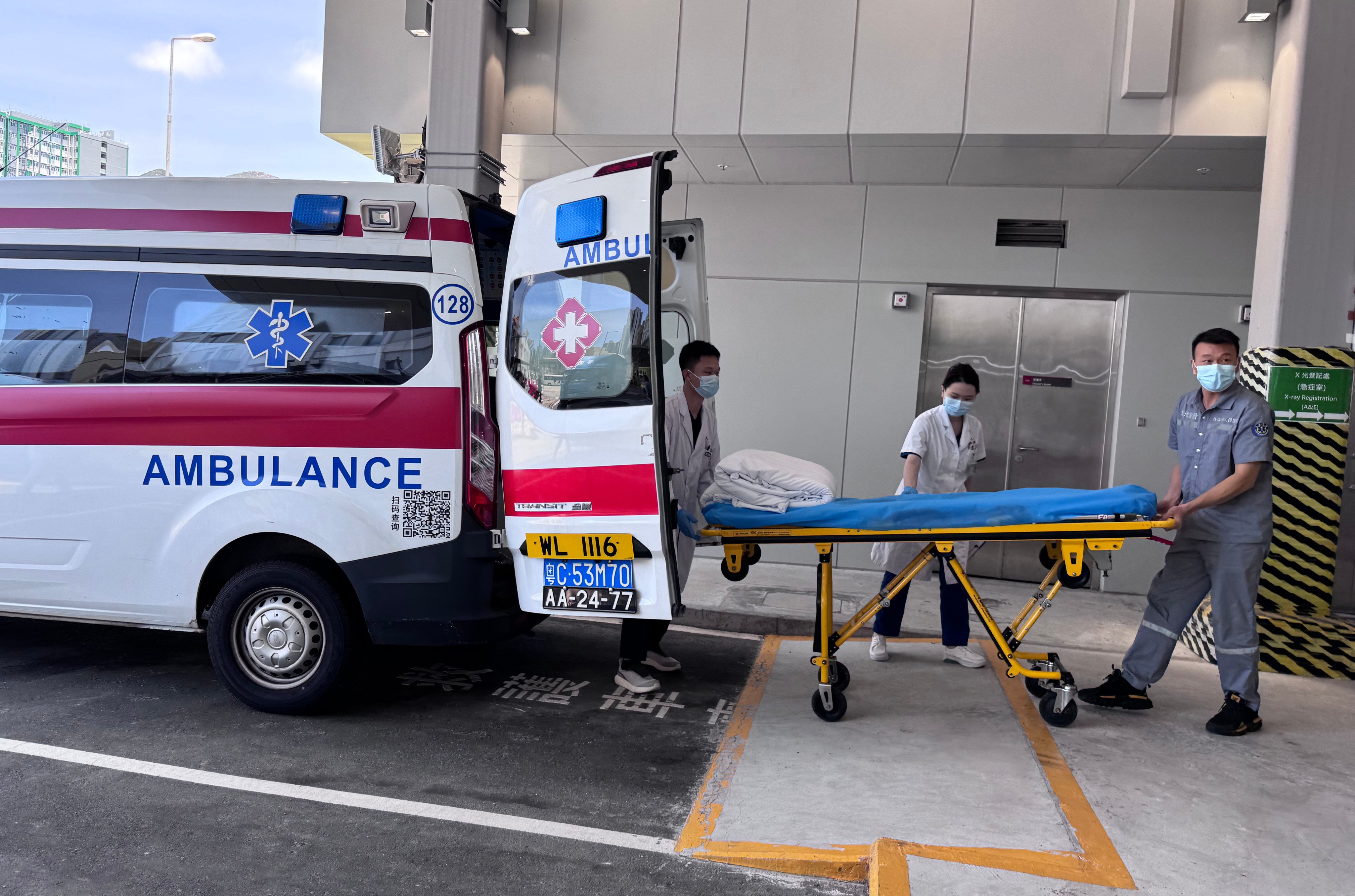 The mainland Chinese patient is the first to be transferred north from Hong Kong under the cross-border ambulance scheme. Photo: Handover