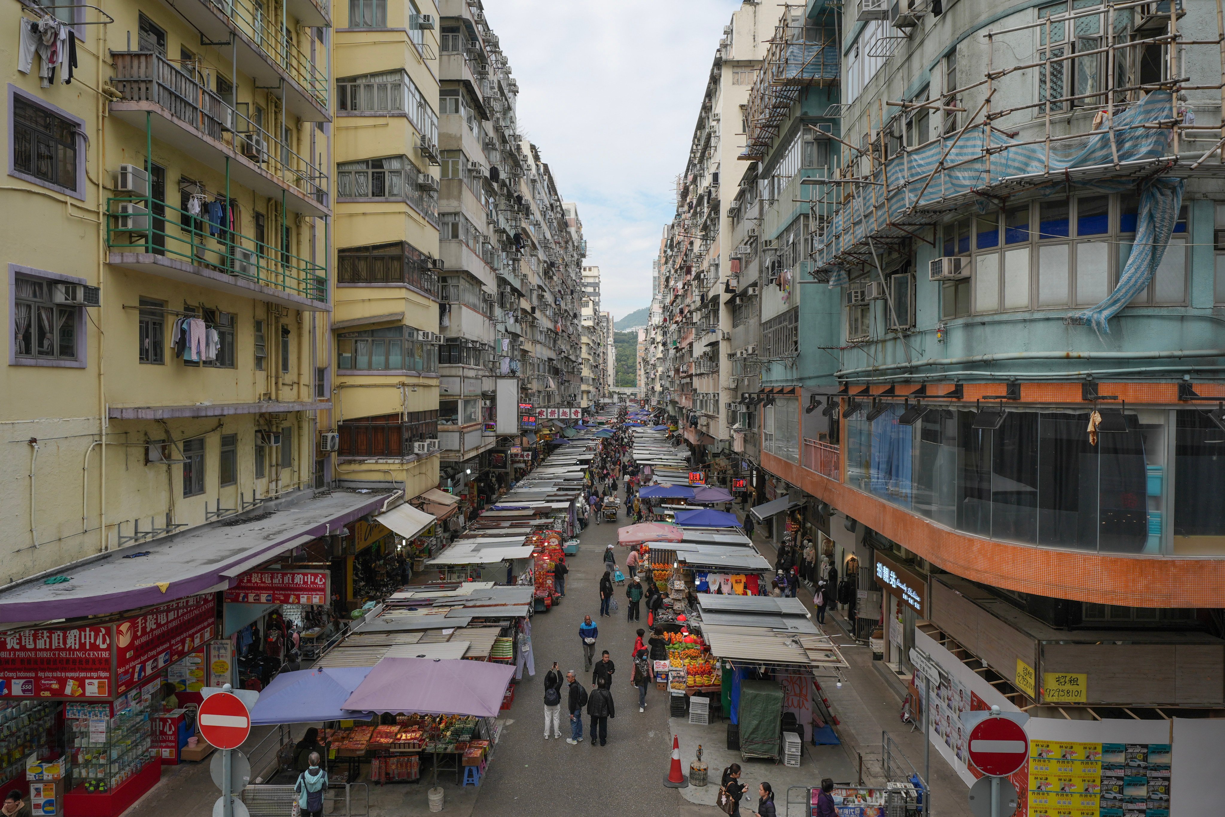 Old residential and commercial buildings in Mong Kok.The roll-out of the IoT smart fire alarm system follows a pilot scheme covering 10 buildings earlier this year. Photo: Eugene Lee