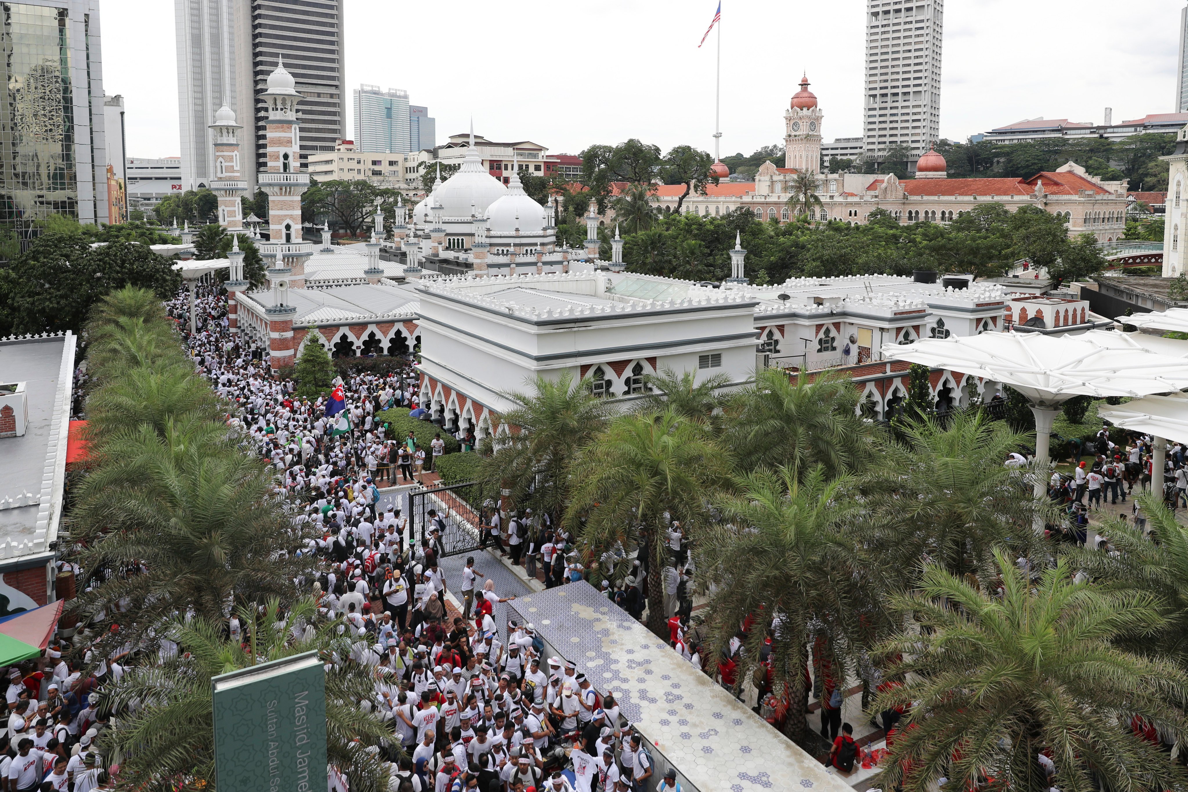 Thousands of protesters rally near a mosque in Kuala Lumpur to celebrate the Malaysian government’s withdrawal of plans to ratify a UN anti-discrimination convention in 2018. Photo: AP