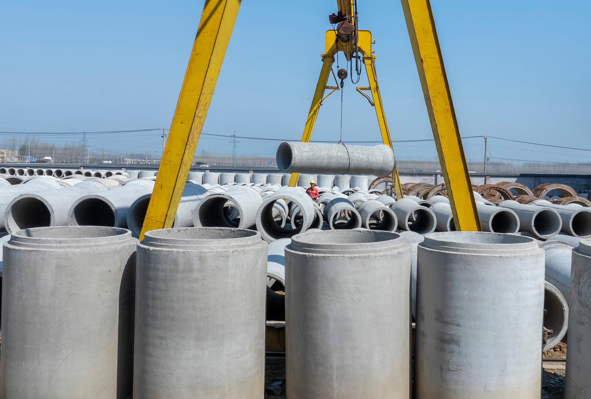 Reinforced concrete drainage pipes are parked at a building materials company in Suqian, in eastern China’s Jiangsu province, on April 1, 2025. Photo: NurPhoto via Getty Images