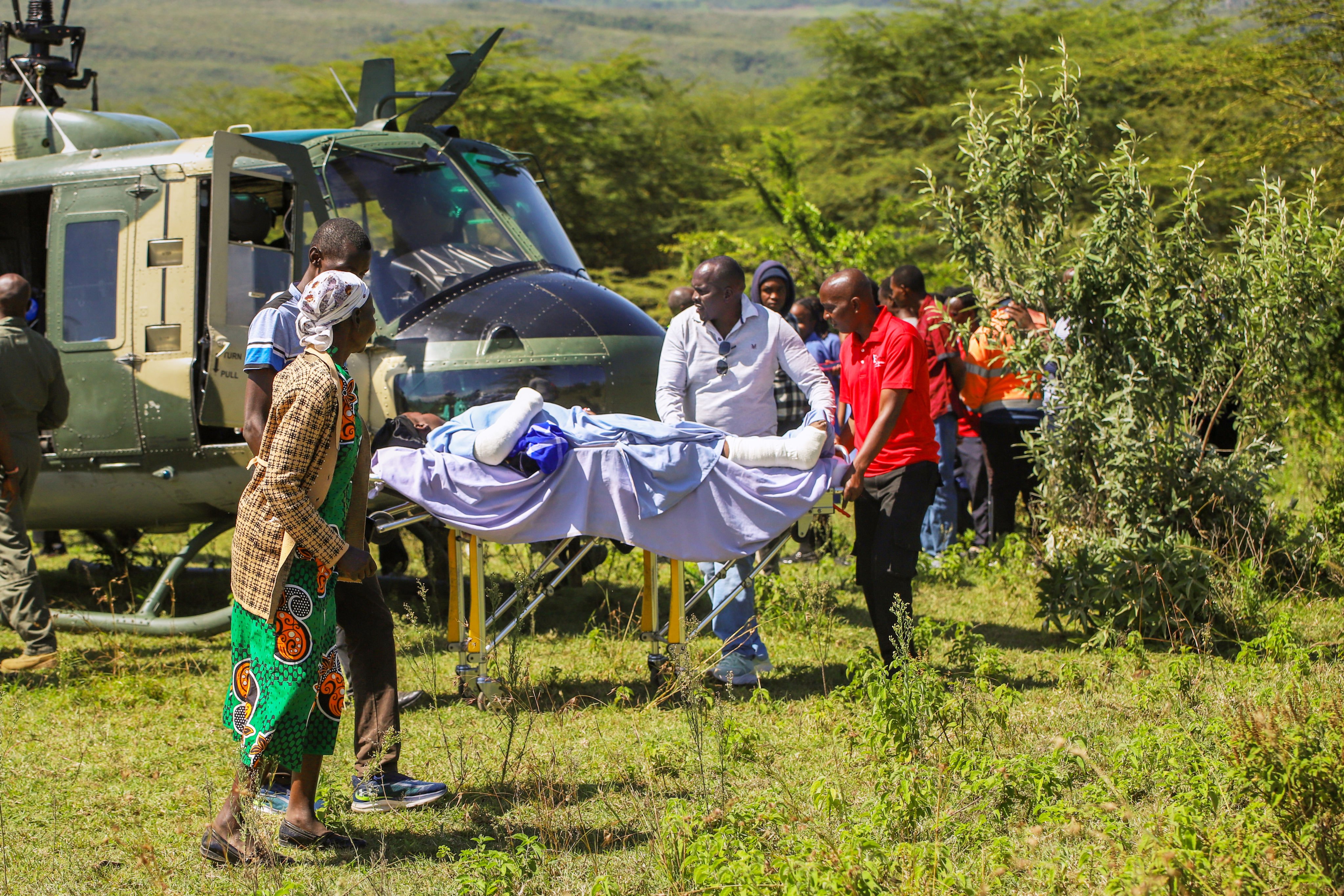 A person is taken out of a Kenyan Air Force aircraft at St Joseph Hospital after a fire at Utumishi Girls School in Kenya’s Gilgil area on Thursday. Photo: AP