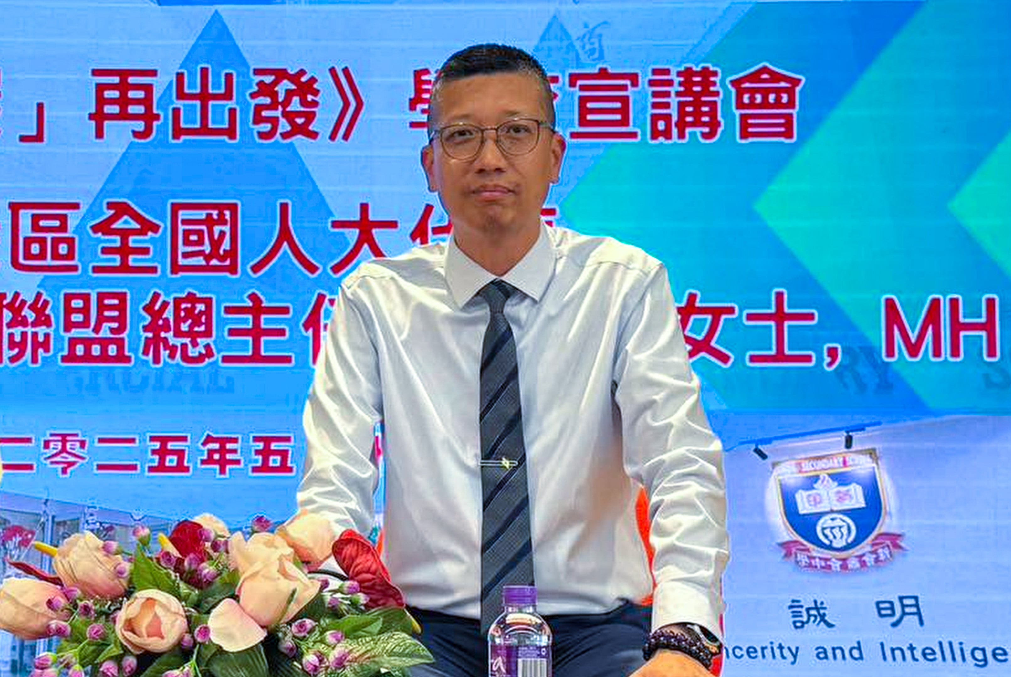 Dr. Lee Cheuk-hing, principal of San Wui Commercial Society Secondary School, is accused of misbehaviour after a viral video shows him swearing at Singaporean officers during a row while leading a study tour to the city-state. Photo: handout