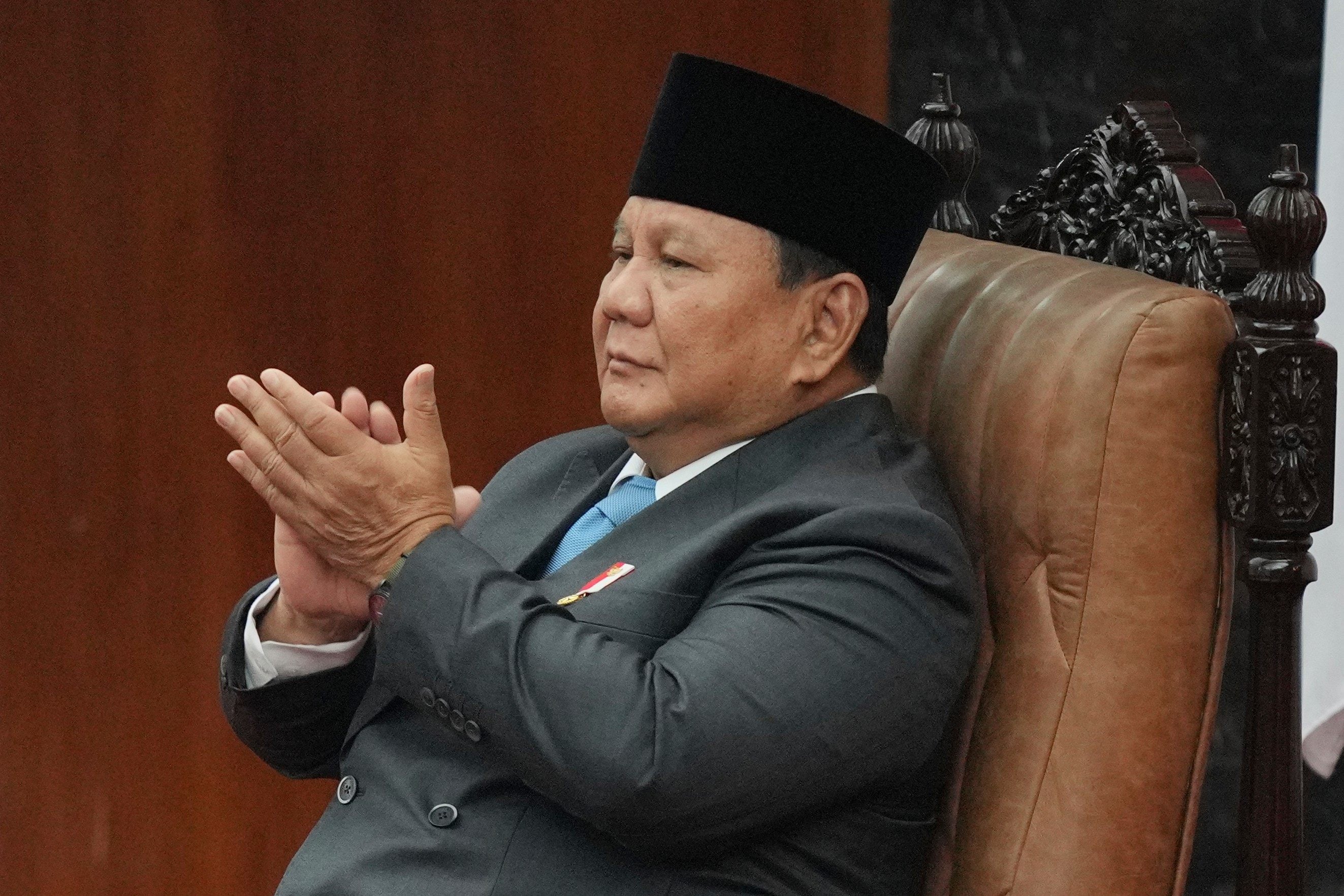 Indonesia’s President Prabowo Subianto reacts during a parliamentary session on May 20. Photo: AP