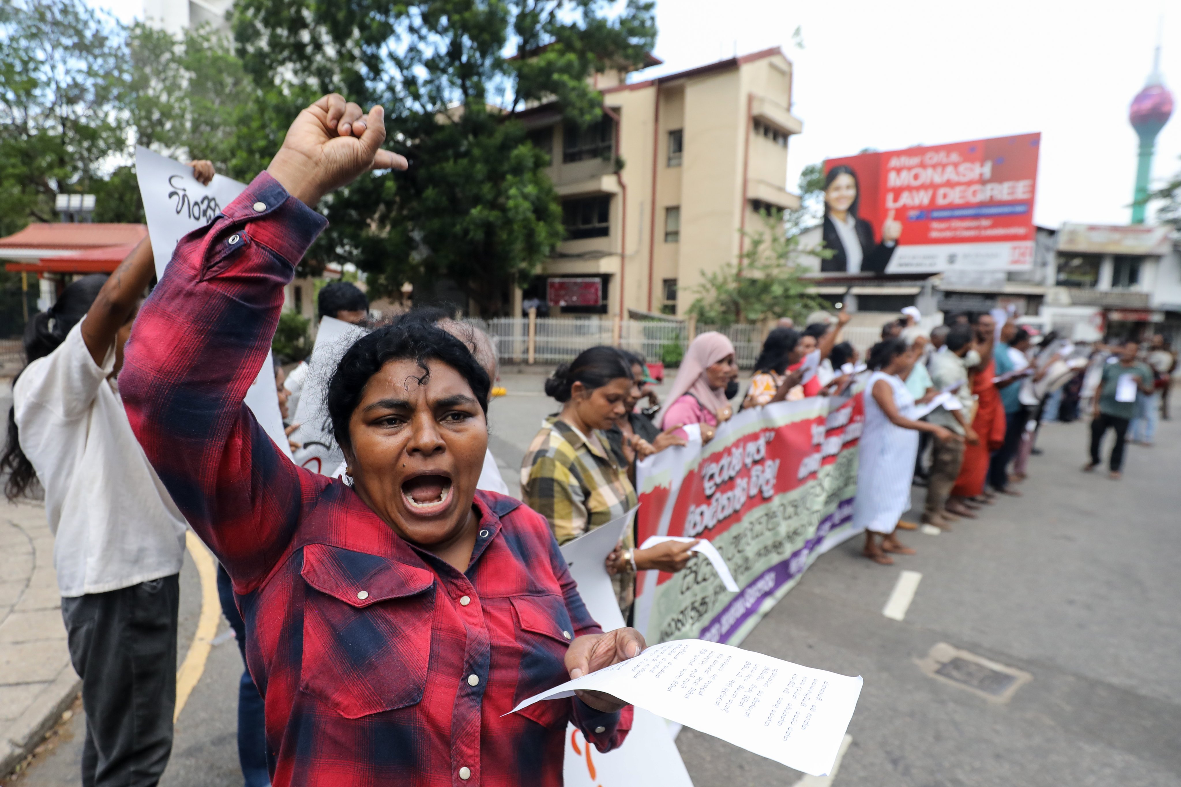 Sri Lankans protest outside the Attorney General’s Department in Colombo earlier this month, calling for the acceleration of the investigation into a recent child abuse case in which a Buddhist monk is suspected to be involved. Photo: EPA