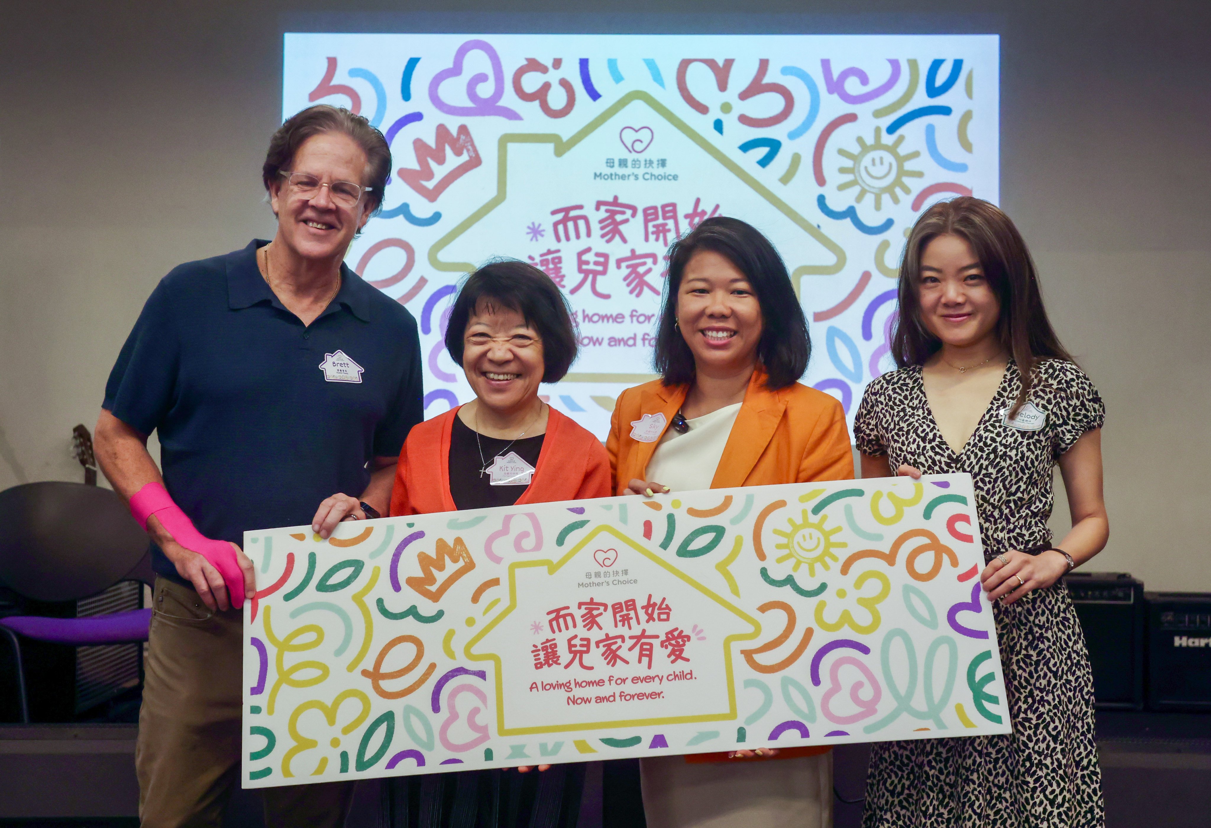 Brett Hilliard, senior pastor of Island Evangelical Community Church (left) joins Mother’s Choice community ambassador Chan Kit-ying, CEO Sky Siu and Havas Hong Kong business director Melody Chan to mark the 10th anniversary of the charity’s self-funded Project Bridge programme. Photo: Jonathan Wong