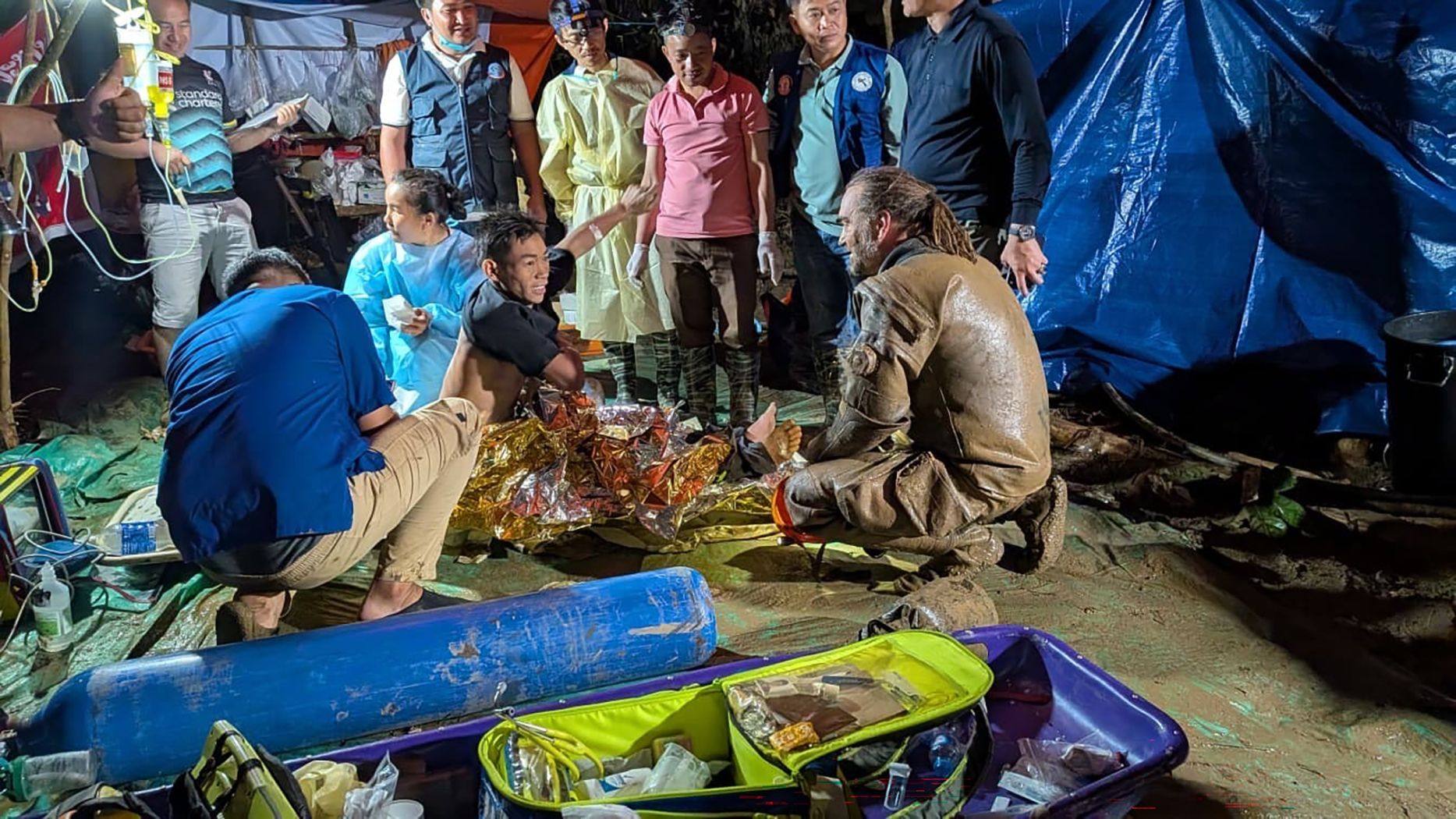 Finnish cave diver Mikko Paasi with the first survivor rescued from a flooded cave network in Xaysomboun province, central Laos, on Saturday. Photo: Josh Richards/dpa