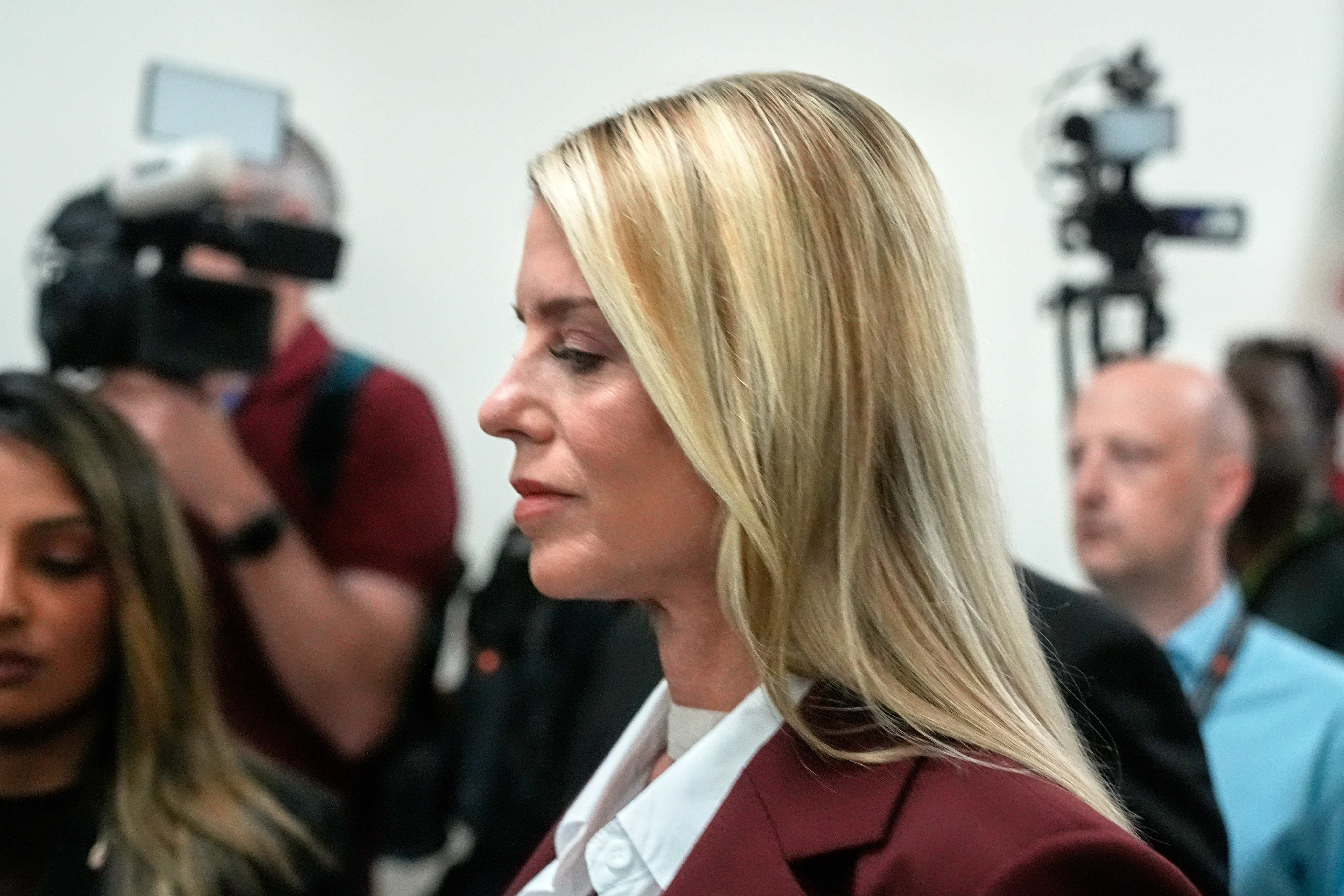 Former US attorney general Pam Bondi arrives on Capitol Hill on Friday. Photo: AP