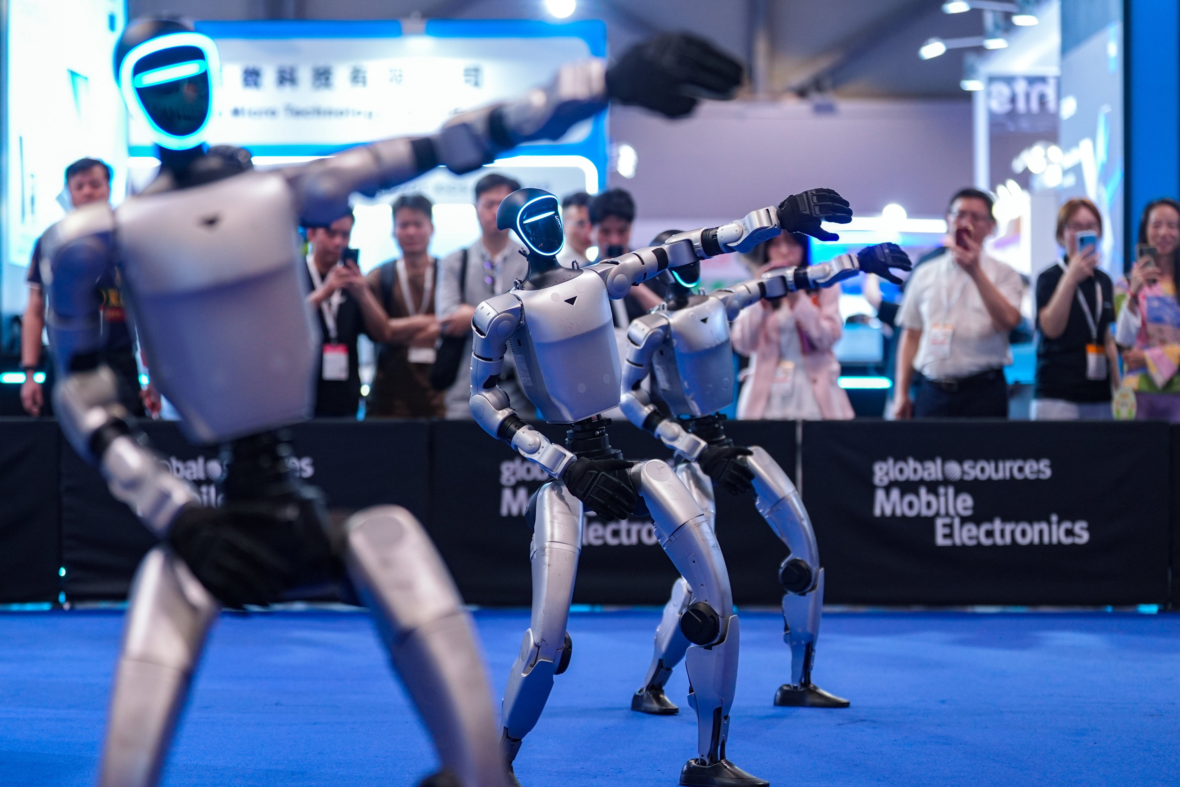 Unitree robots perform dance moves at Global Sources Hong Kong Shows at AsiaWorld-Expo in Chek Lap Kok. The exhibition showcases the newest technologies in mobile accessories and AI-powered consumer electronics. Photo: Eugene Lee