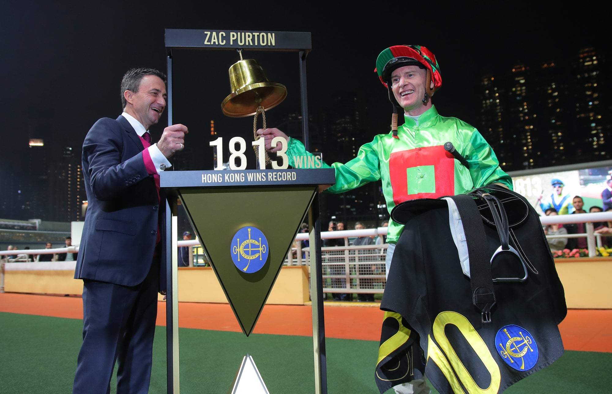Zac Purton and Douglas Whyte (left) celebrate after the record of 1813 victories. Photo: Kenneth Chan. Zac Purton and Douglas Whyte (left) celebrate after the record of 1813 victories. Photo: Kenneth Chan.