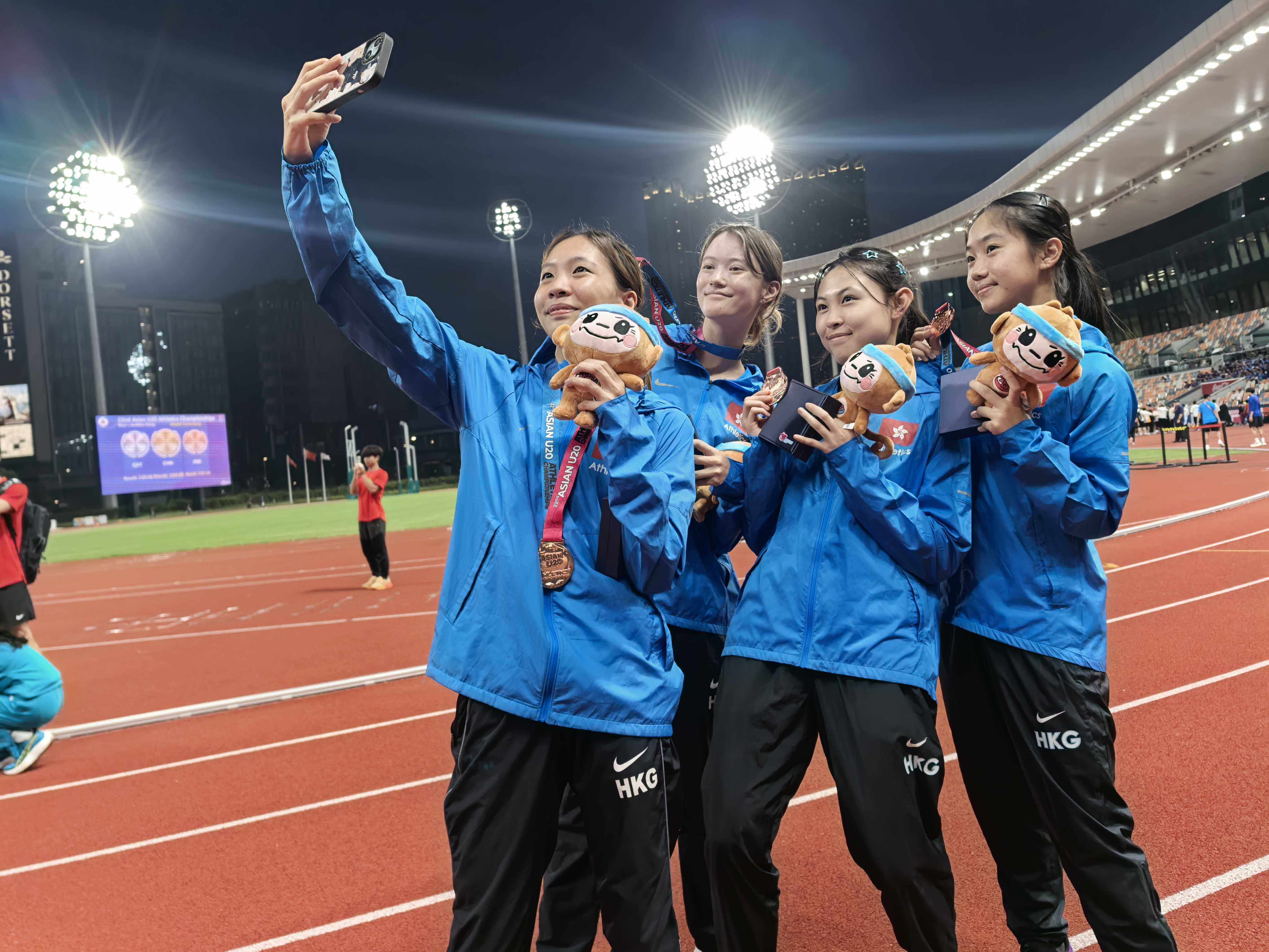 Hong Kong's 4x400m relay team of (from left) Chow Chi-kiu, Jane Karlsson, Lee Tsz-yiu and Cheng Tsz-yan won the bronze, behind India and Kazakhstan. Photo: Ada Li