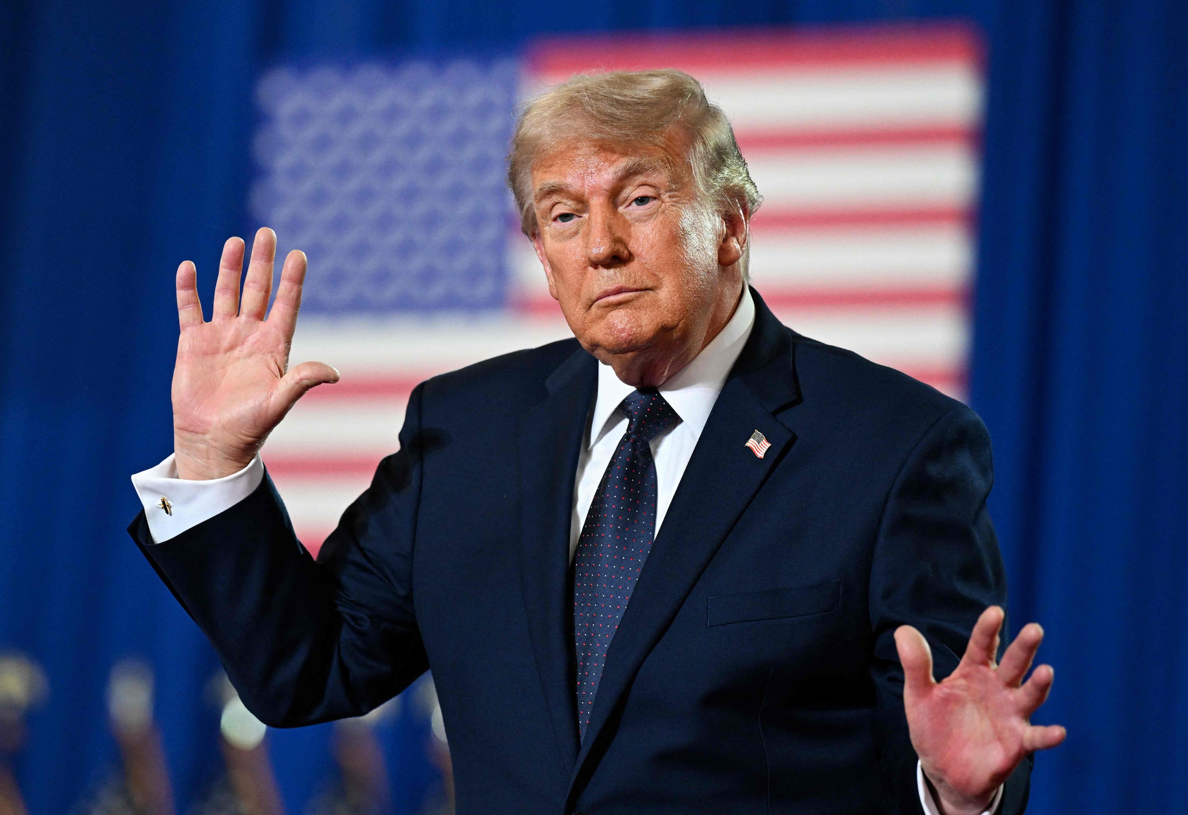 US President Donald Trump dances on stage during a campaign and economic policy event in Suffern, New York, on May 22. Photo: AFP