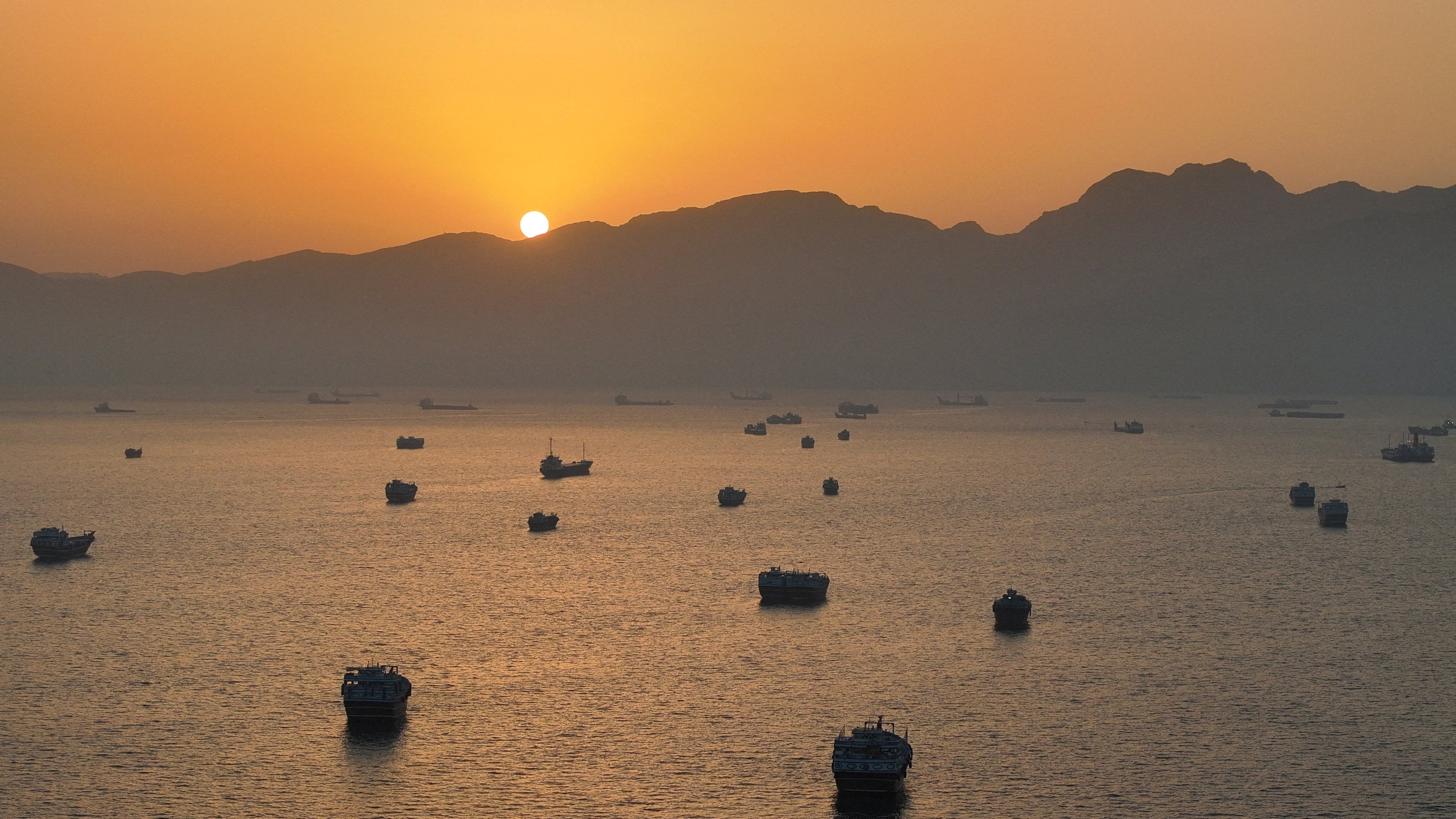A drone view shows vessels anchored in the Strait of Hormuz, seen from Musandam in Oman, on May 30. Photo: Reuters