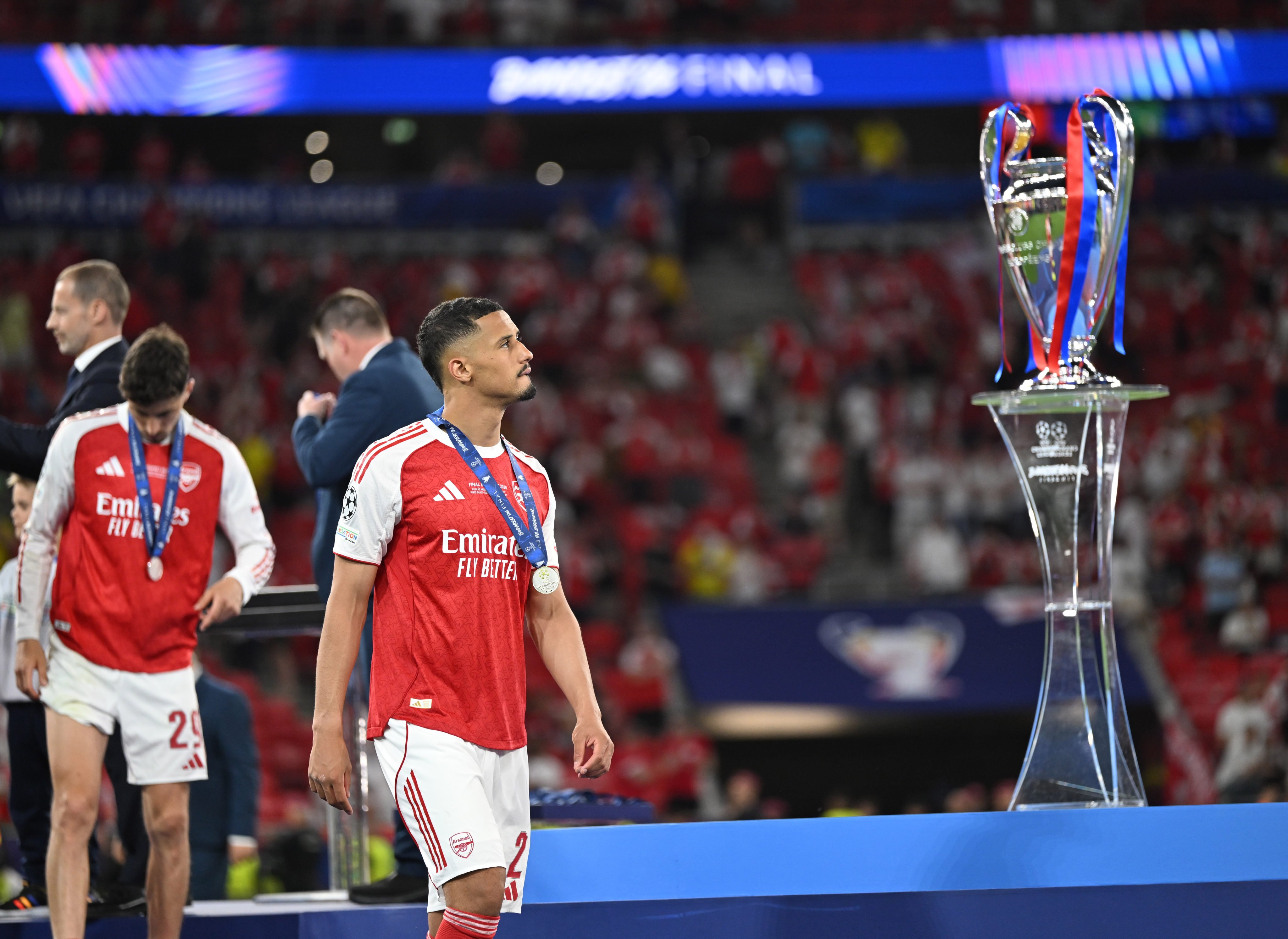 William Saliba wistfully gazes at the Champions League trophy that again evaded Arsenal. Photo: Xinhua