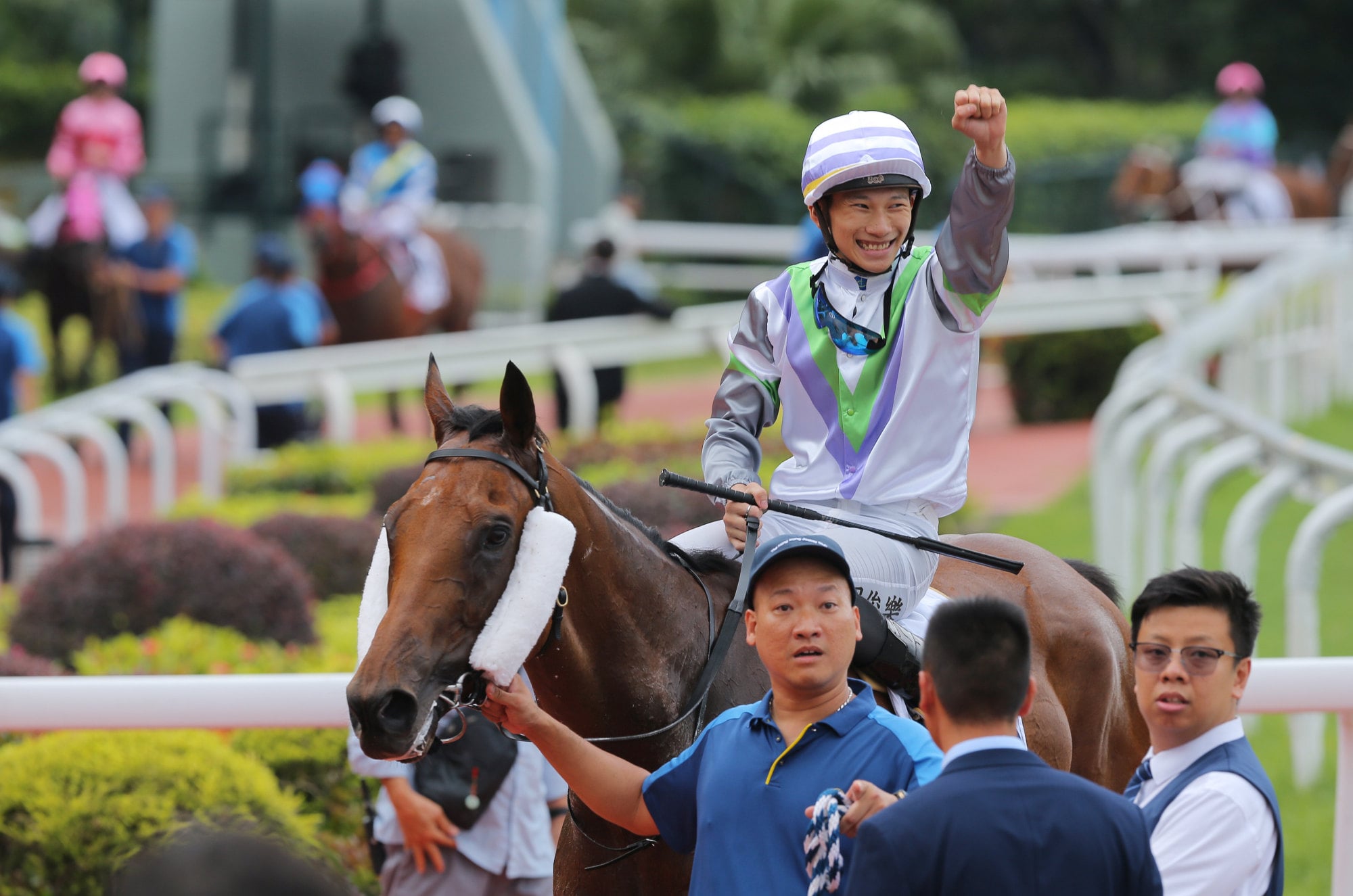 Jerry Chau celebrates the wins of Light Years Charm at Sha Tin. Jerry Chau celebrates the wins of Light Years Charm at Sha Tin.