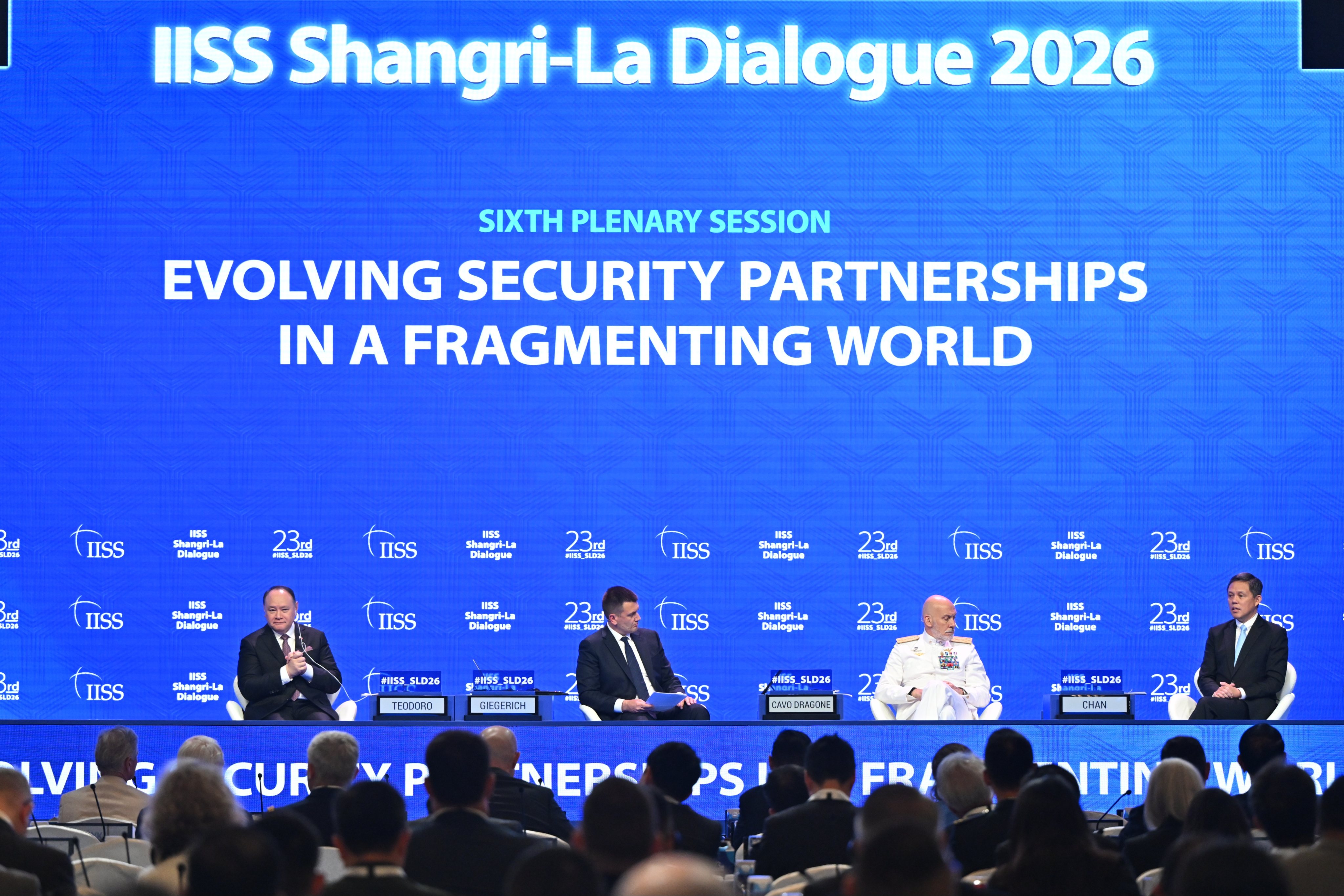 Participants speak at the Shangri-La Dialogue defence forum in Singapore on Sunday. Photo: Singapore’s Ministry of Defence