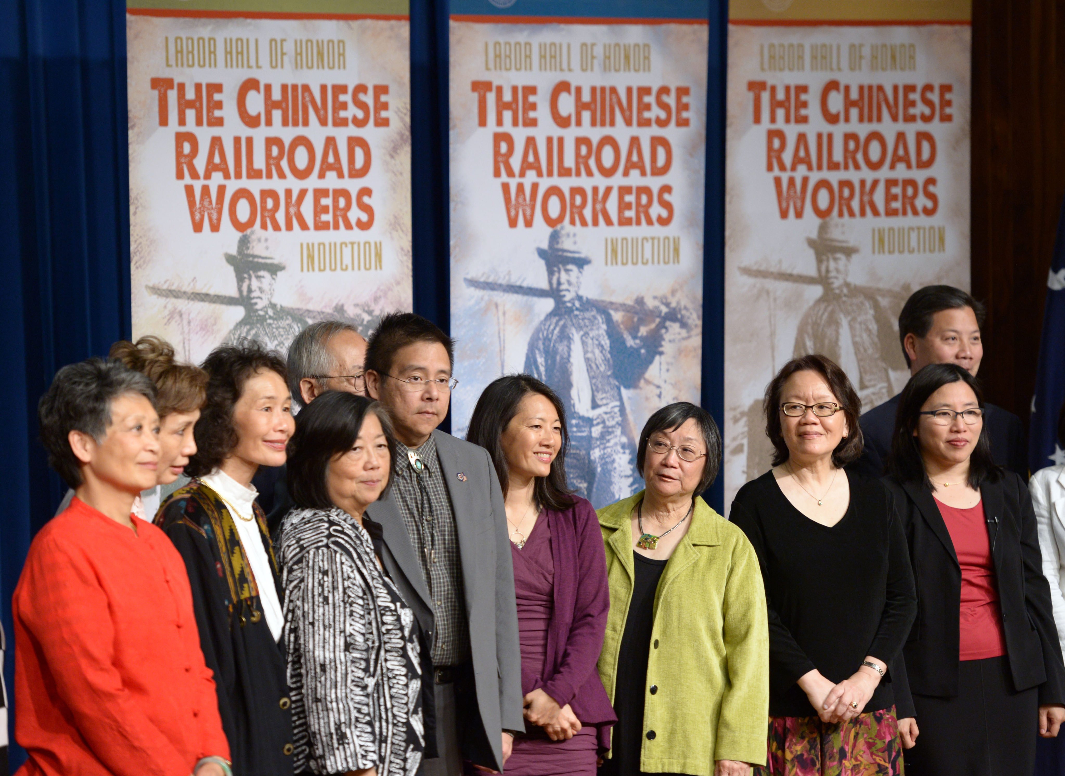 Descendants of Chinese railroad workers gather during a ceremony for 12,000 Chinese immigrant labourers who worked on the Central Pacific Railroad between 1865 and 1869 being inducted into the Labor Hall of Honor, at the Department of Labor, in Washington DC, on May 9, 2014. Photo: Xinhua