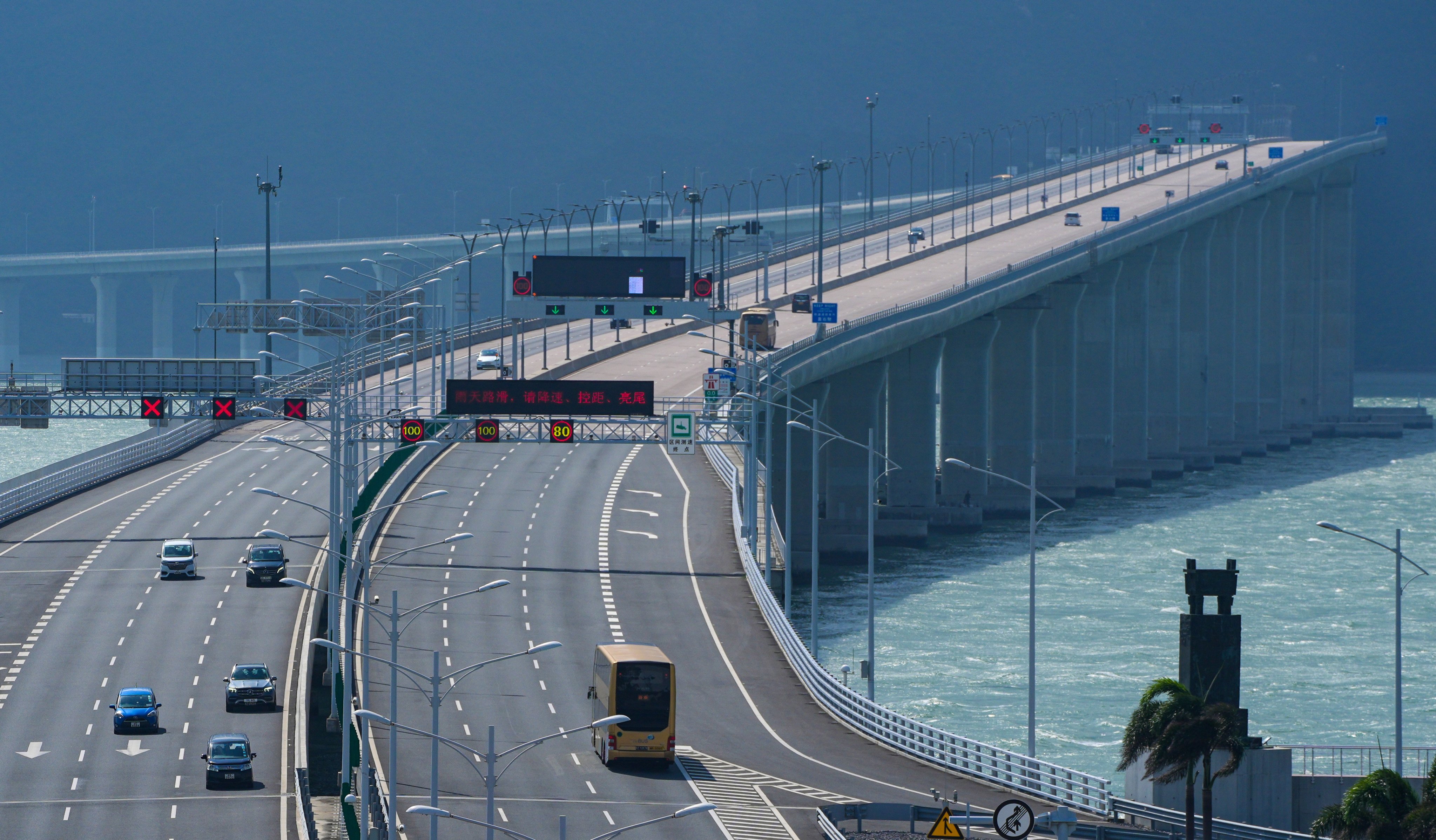 The scheme allows eligible private car owners in Hong Kong to drive into Guangdong via the Hong Kong–Zhuhai–Macau Bridge. Photo: Eugene Lee
