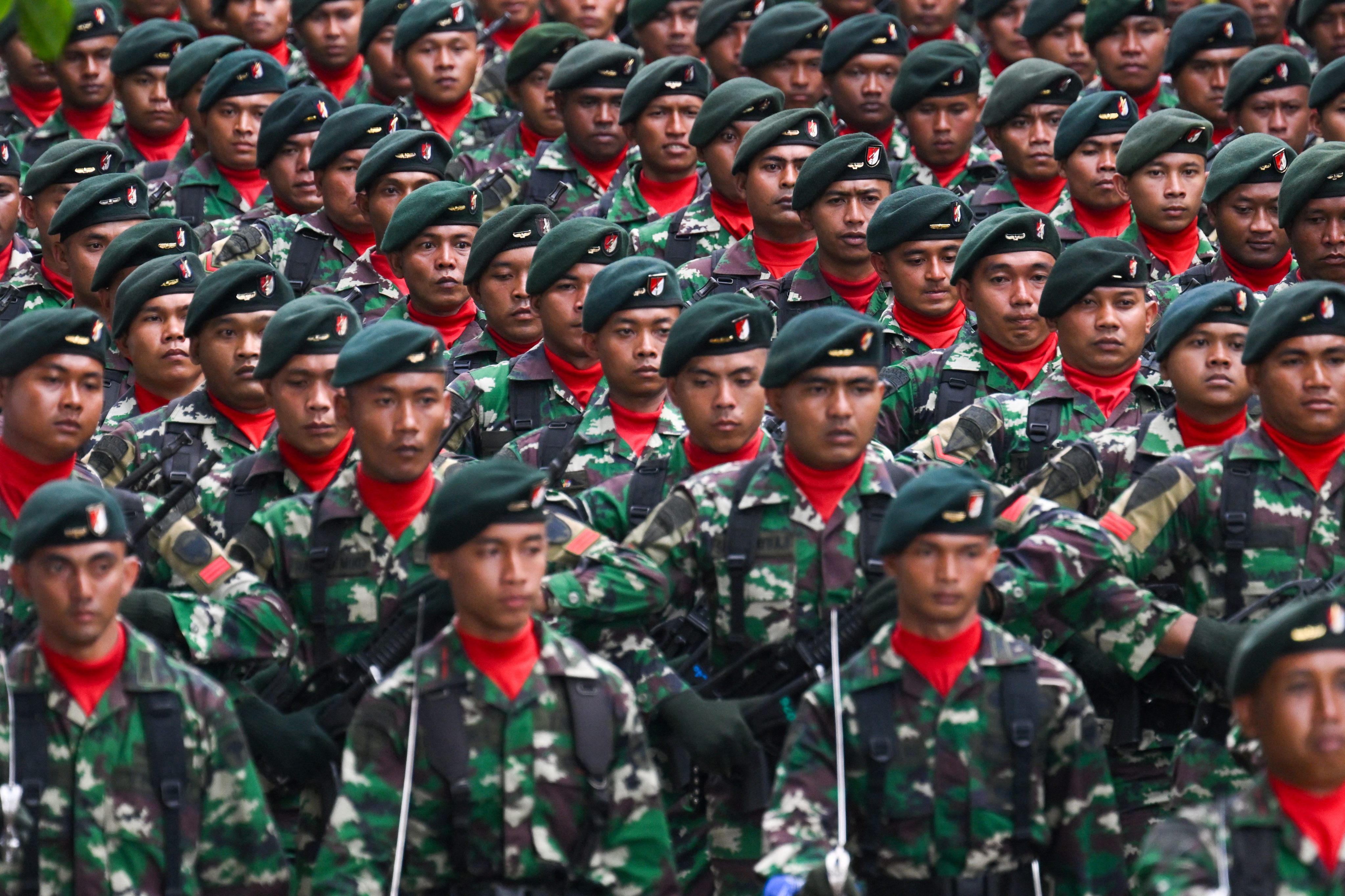 Indonesian National Armed Forces (TNI) personnel march during anniversary celebrations in Banda Aceh in 2024. Photo: AFP