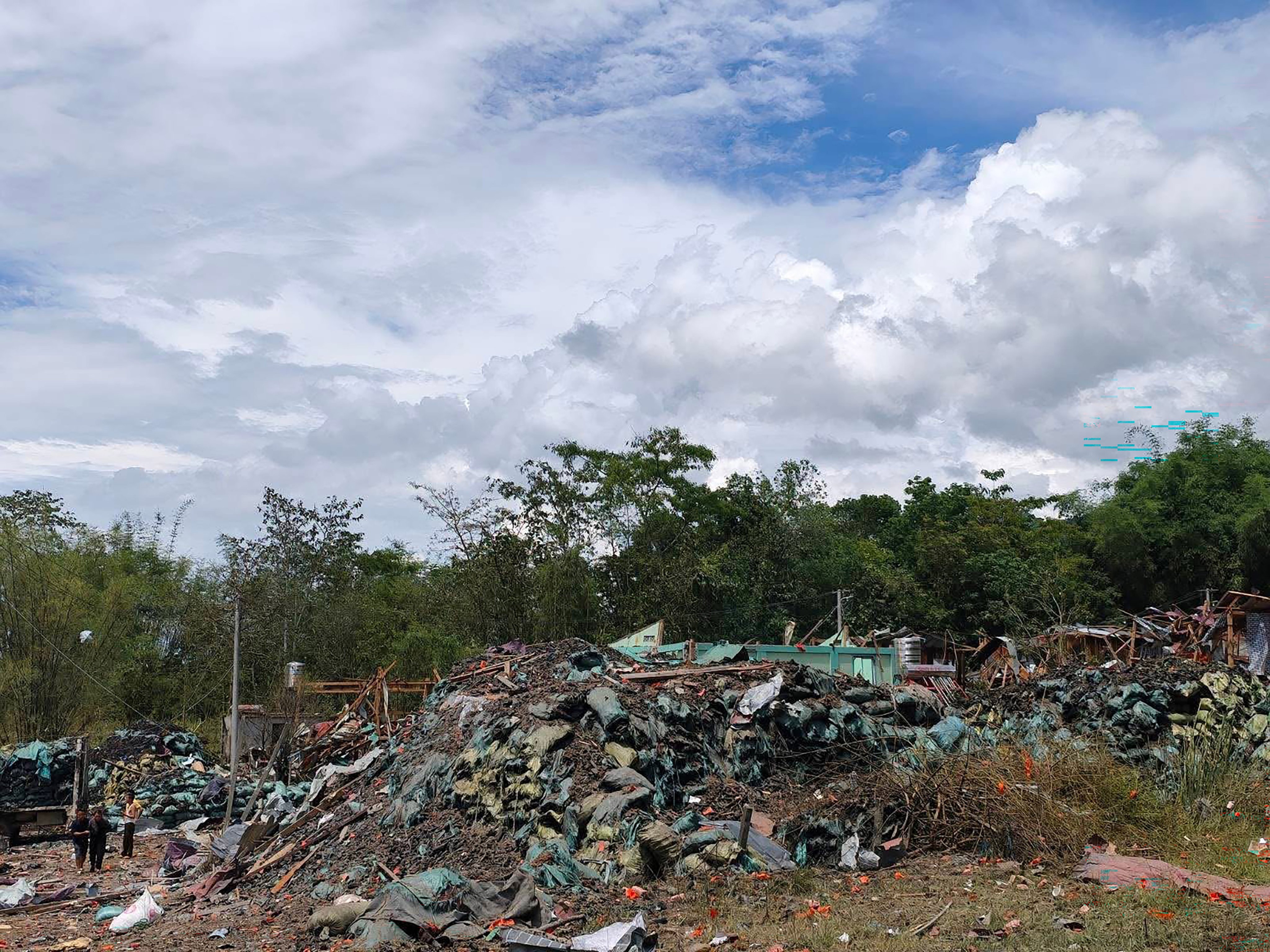 A damaged building after a blast at an explosives depot in Kaung Tat village, Namkham, northern Shan State, Myanmar on Sunday. Photo: EPA