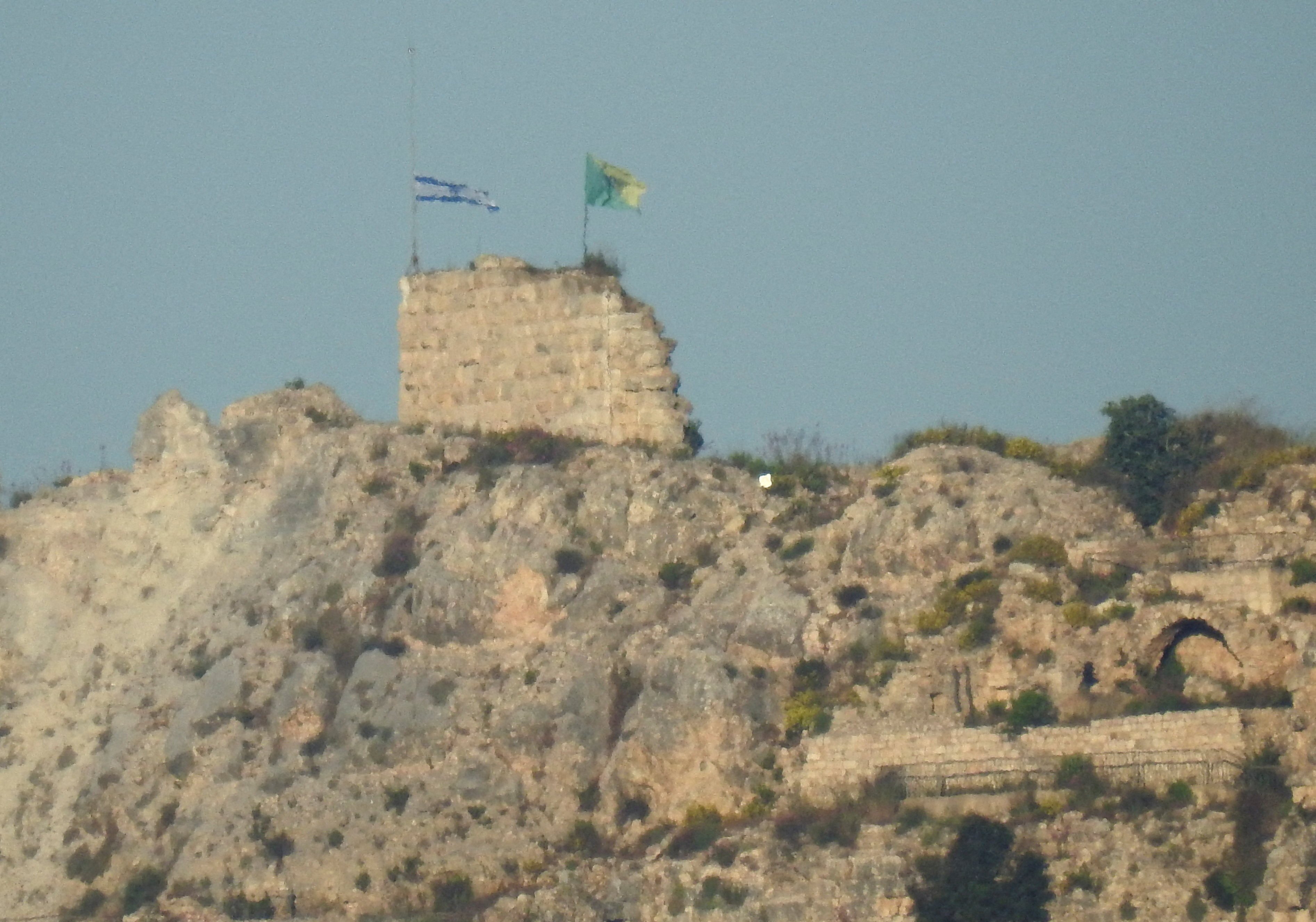 An Israeli flag and a flag of the Golani Brigade raised on Beaufort Castle. Photo: Reuters