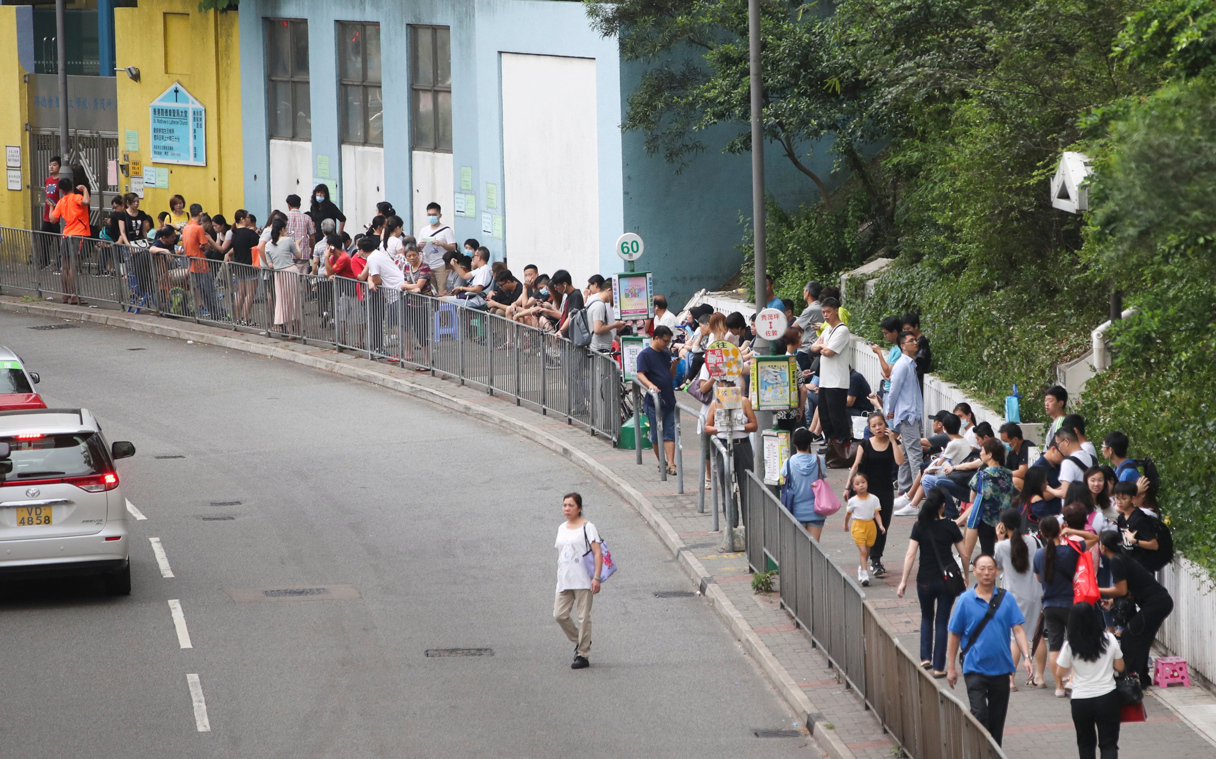 Some Hong Kong parents have been left confused after receiving SMS notifications about their children’s primary school allocations a day before the official announcement. Photo: Edward Wong