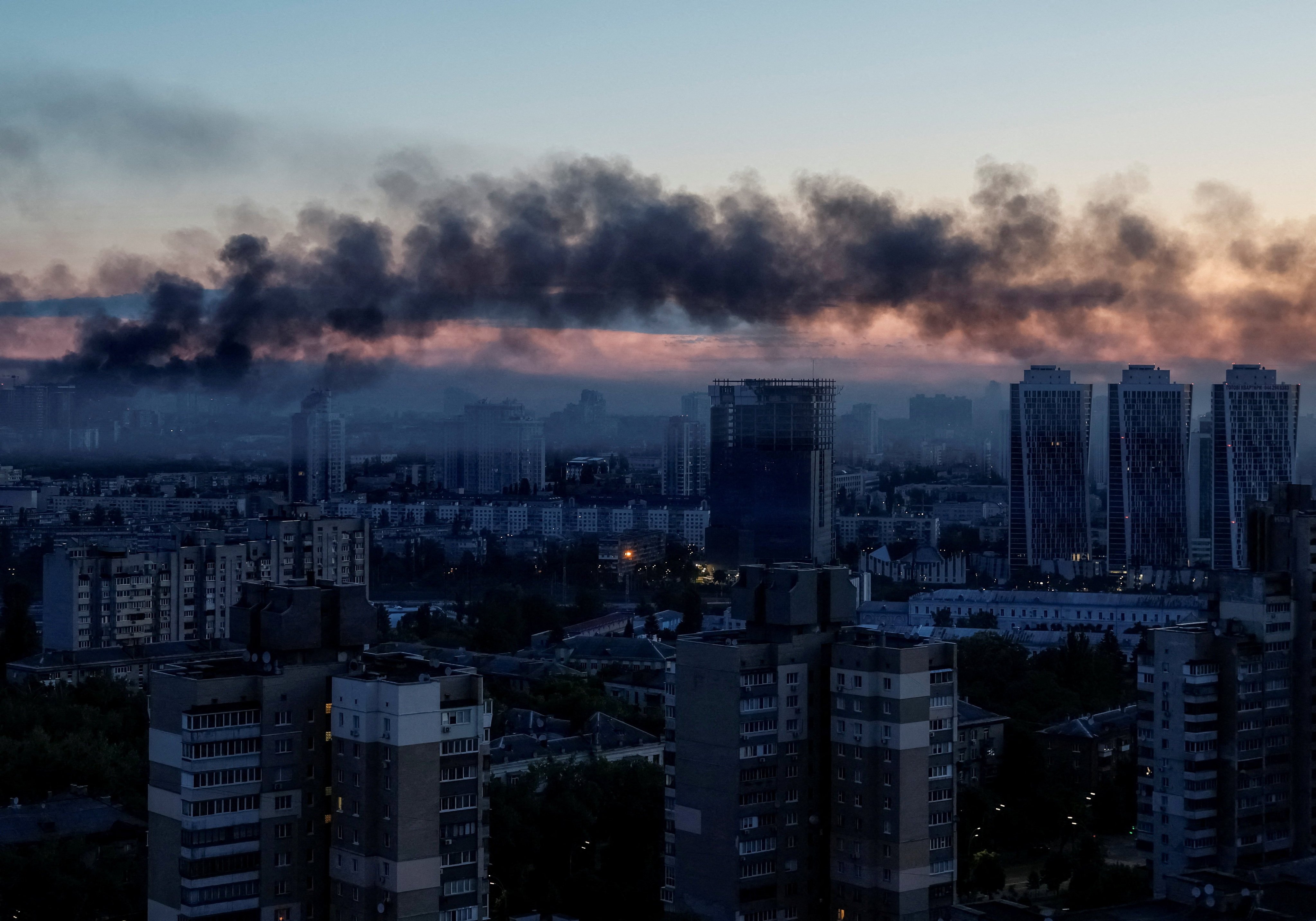 Smoke rises in Ukraine's capital. Photo: Reuters