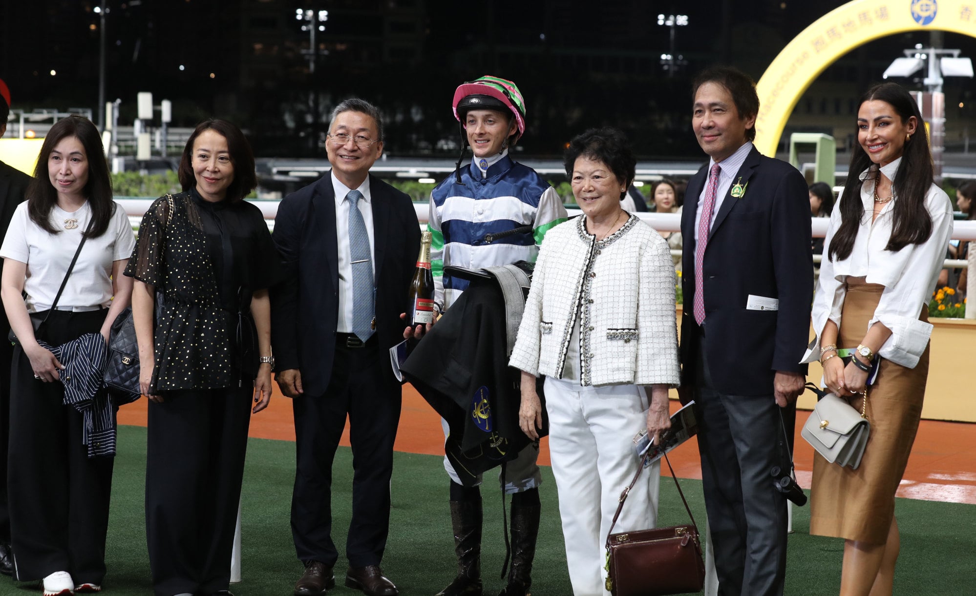 Connections celebrate the win of Packing Angel at Happy Valley. Connections celebrate the win of Packing Angel at Happy Valley.