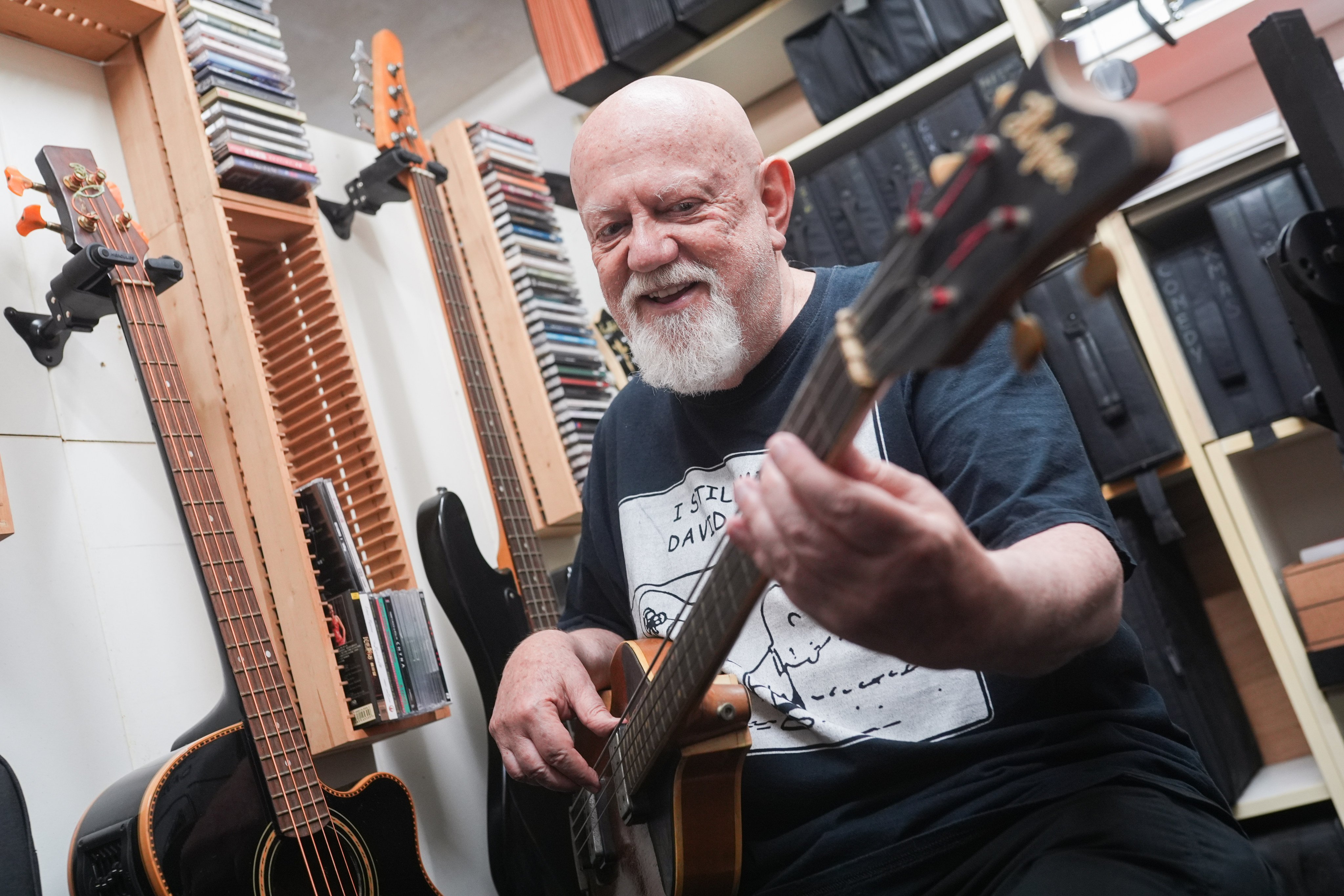 Hong Kong-based musician and actor Anders Nelsson plays his bass guitar during an interview at his studio in Fo Tan, in Hong Kong’s Sha Tin district, on May 13, 2026. Photo: Eugene Lee