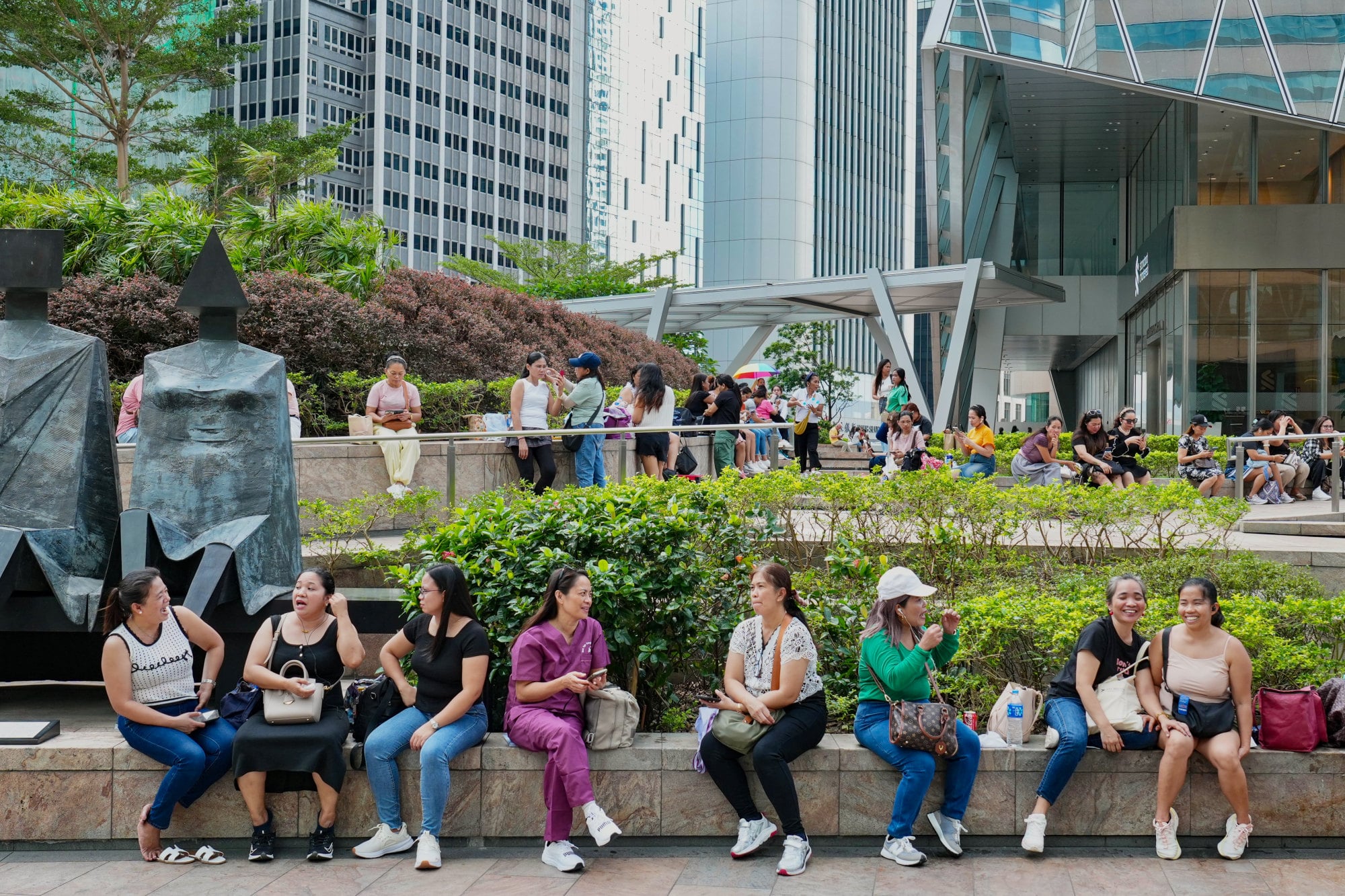 Domestic helpers enjoy a day off in Central. Photo: Karma Lo