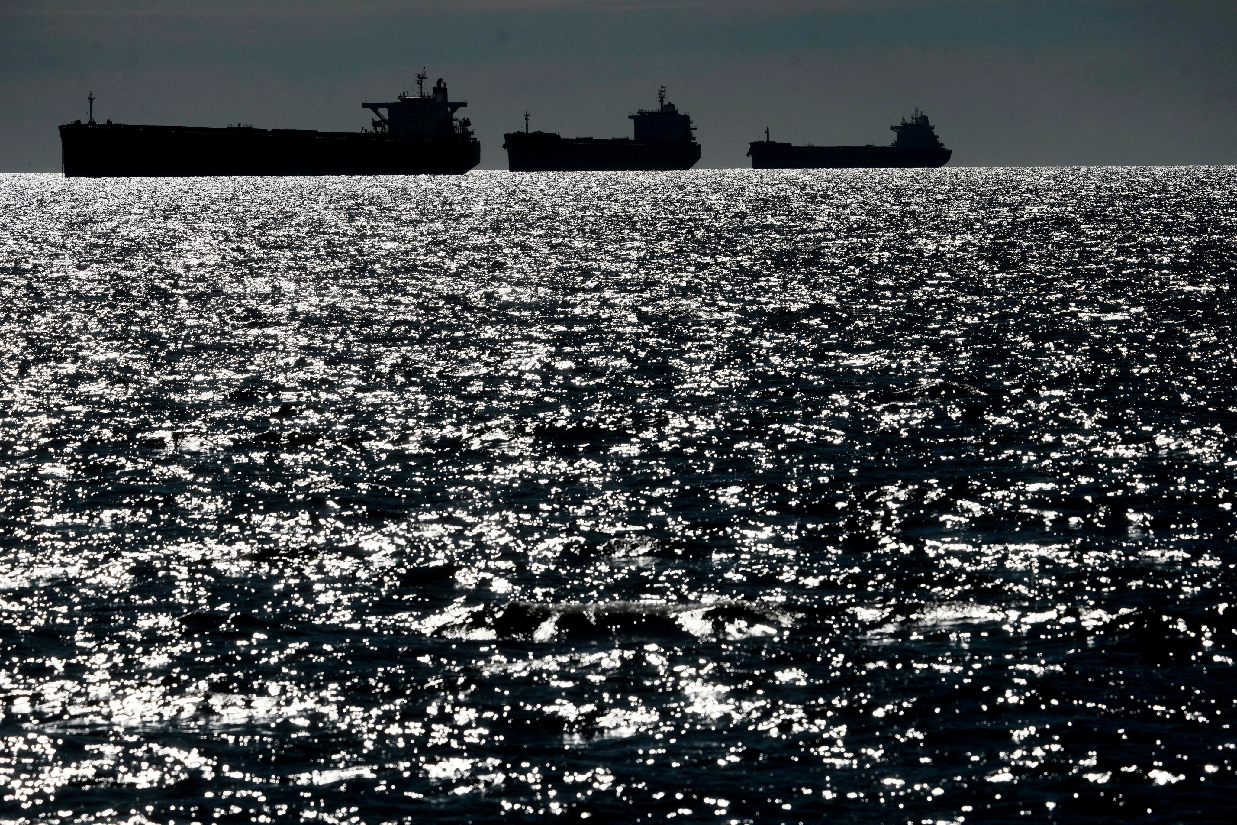 Russia’s “shadow fleet” vessels wait in the unofficial anchorage area in the Gulf of Finland near Vaindloo, Estonia, on April 10. Photo: Reuters