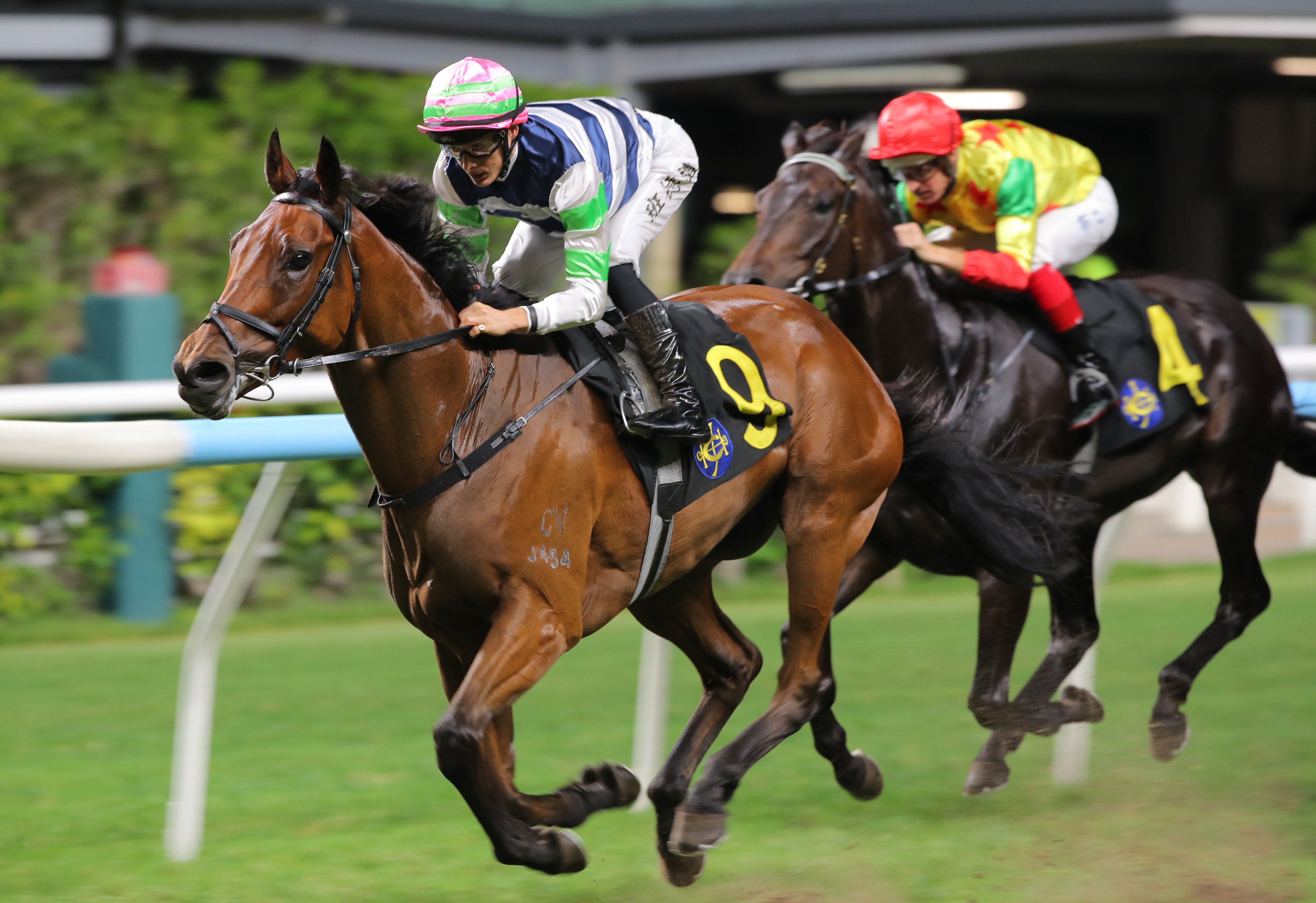 Packing Angel, ridden by Harry Bentley, wins at Happy Valley. Photos: Kenneth Chan