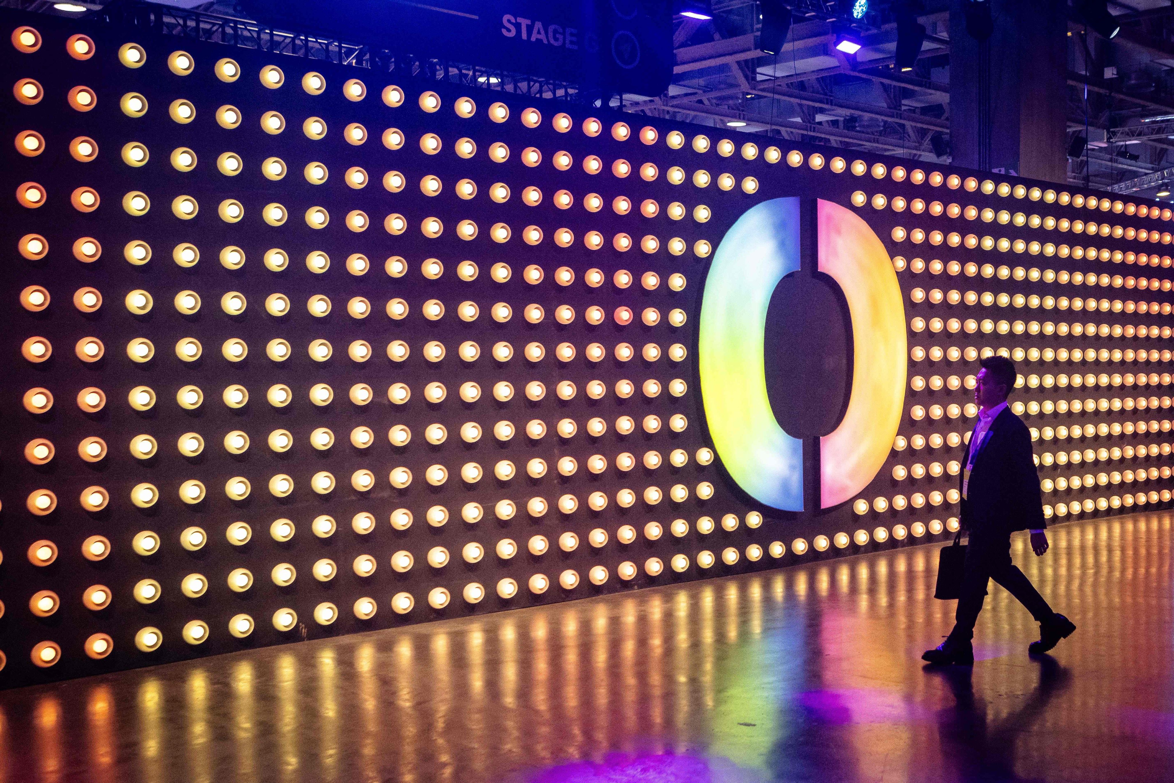 A visitor arrives at the Beyond Expo technology exhibition in Macau on Friday. Photo: AFP