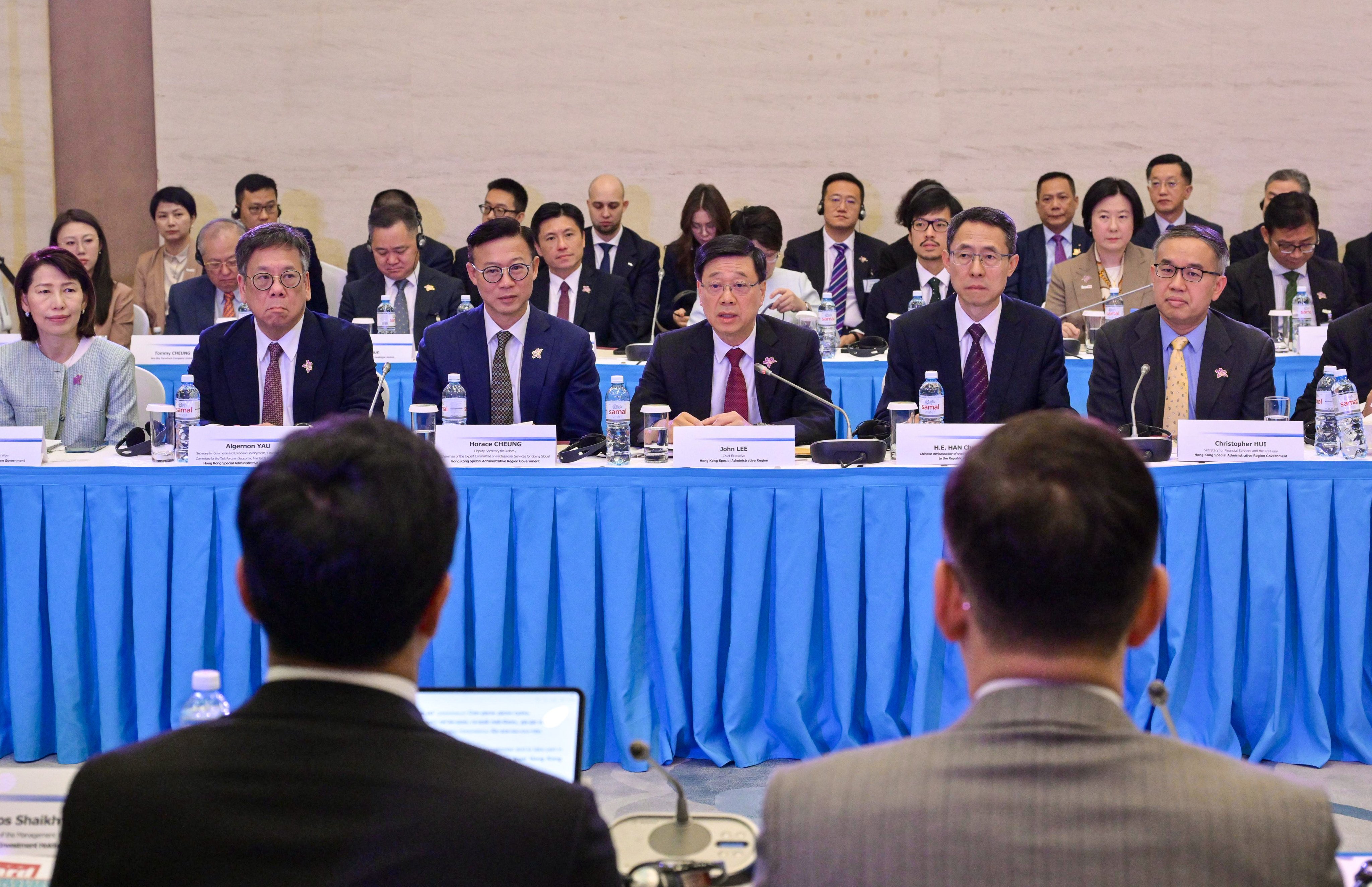 Chief Executive John Lee (third right) and other officials attend a meeting with Baiterek National Investment Holding in Astana. Photo: Handout
