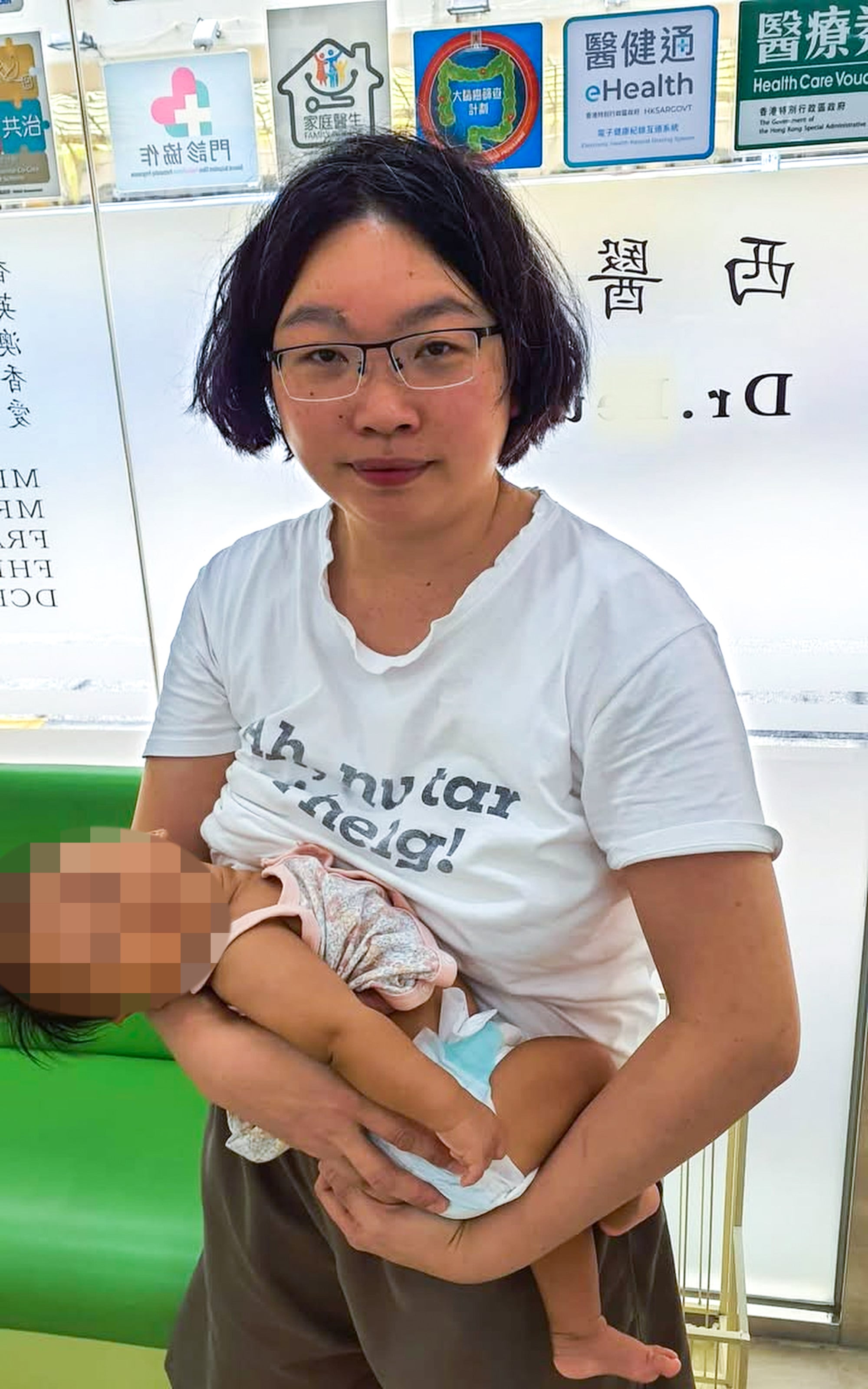 Kwan Pui-sin with baby Danny. All births must be registered within 42 days under Hong Kong law. Photo: Handout Kwan Pui-sin with baby Danny. All births must be registered within 42 days under Hong Kong law. Photo: Handout