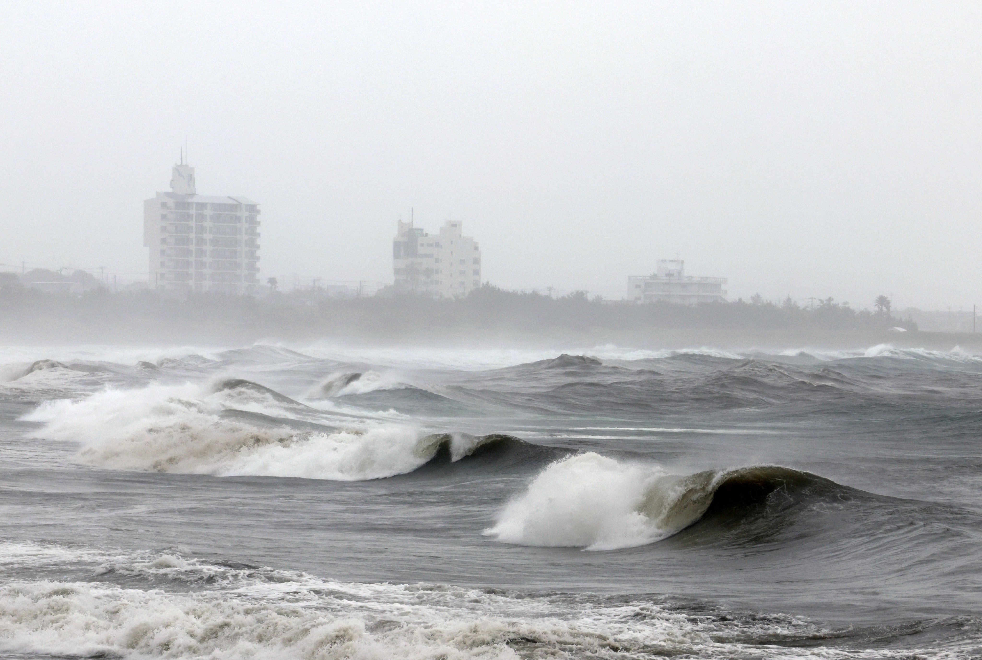 Waves lash the coastline of Minamiboso in Japan’s Chiba Prefecture as Typhoon Jangmi approaches on Wednesday.  Photo: EPA