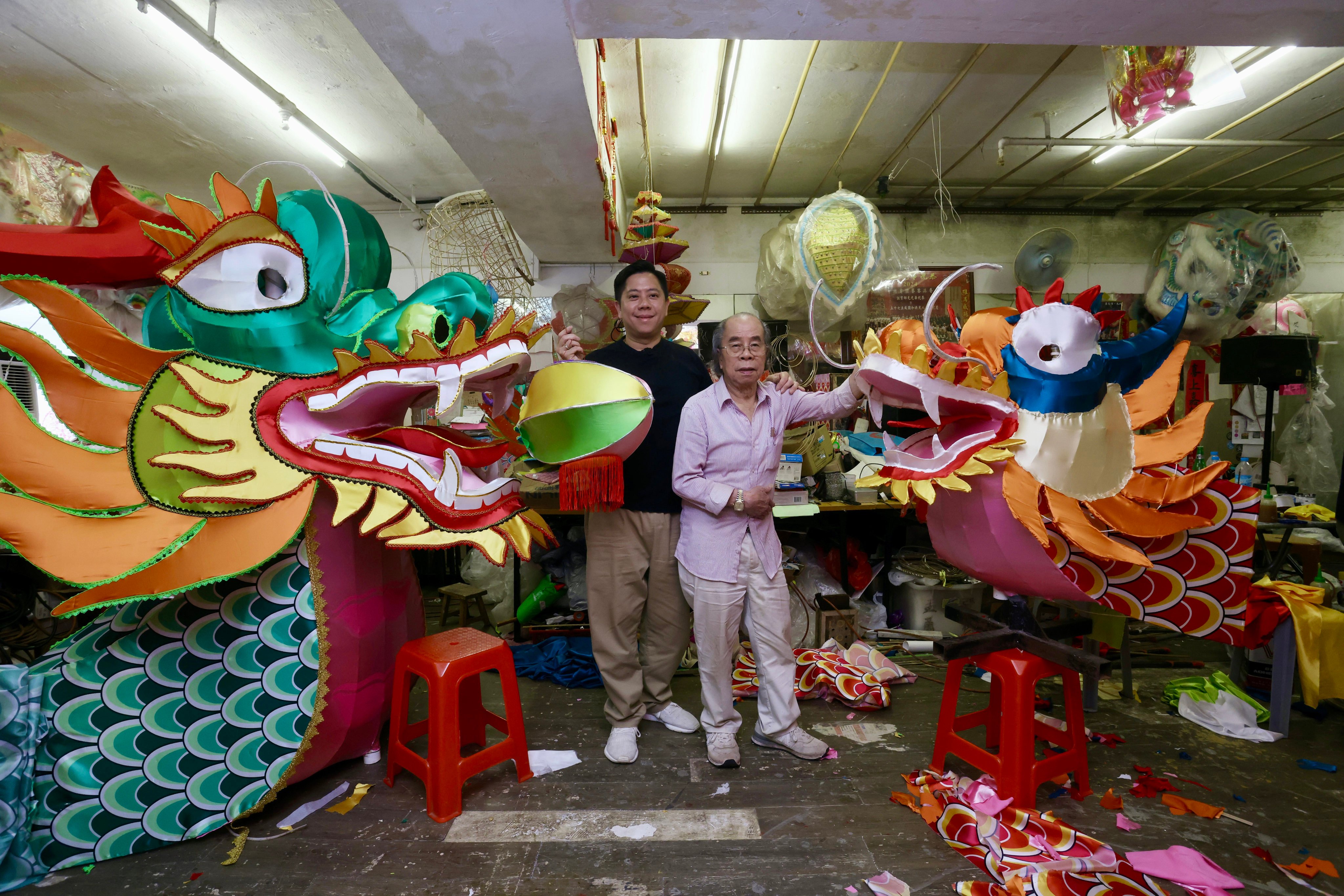 Hui Ka-hung (left) and his father Hui Cheung-chun make traditional Chinese lanterns for a variety of festivals in Hong Kong. Photo: Jonathan Wong