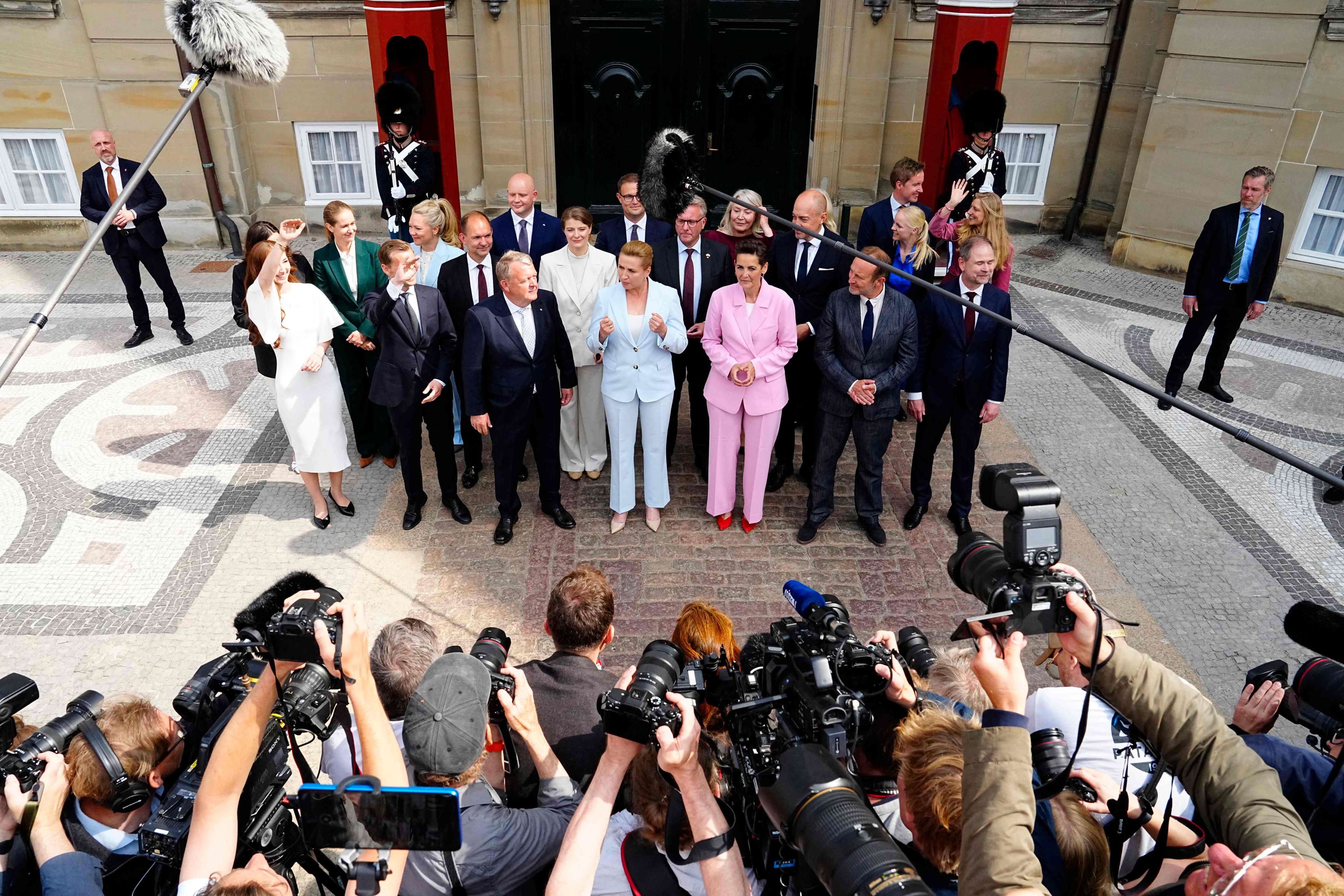 (First row, from left) Denmark’s Foreign Minister Lars Loekke Rasmussen of the Moderates party, Denmark’s Prime Minister Mette Frederiksen of the Social Democrats party, Pia Olsen Dyhr of the Socialist People’s Party and Martin Lidegaard of Denmark’s The Social Liberal Party address the media outside Amalienborg Castle in Copenhagen on Wednesday. Photo: AFP